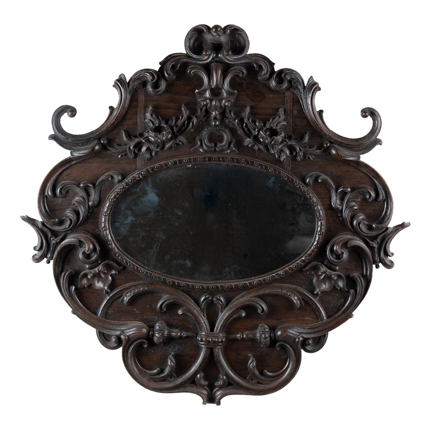 Miroir ovale en chêne foncé sculpté du Portugal du début du 20e siècle