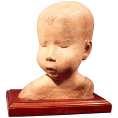 Early 20th Century Carved Stone Bust of a Young Child Antique Early 20th Century Carved Stone Bust of a Young Child