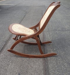Early 20th Century Carved Walnut and Upholstered Folding Rocking Chair