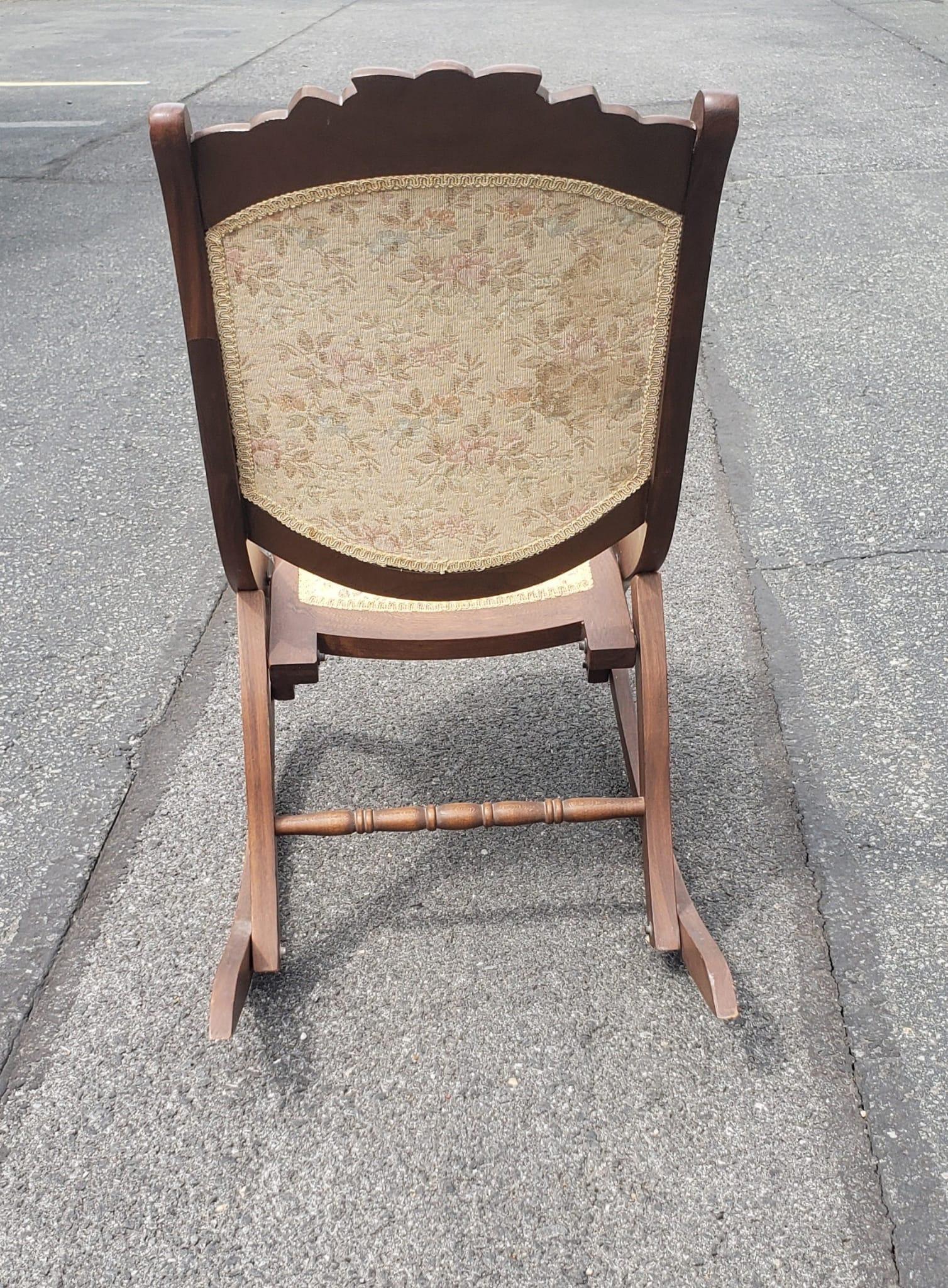 antique upholstered rocking chair