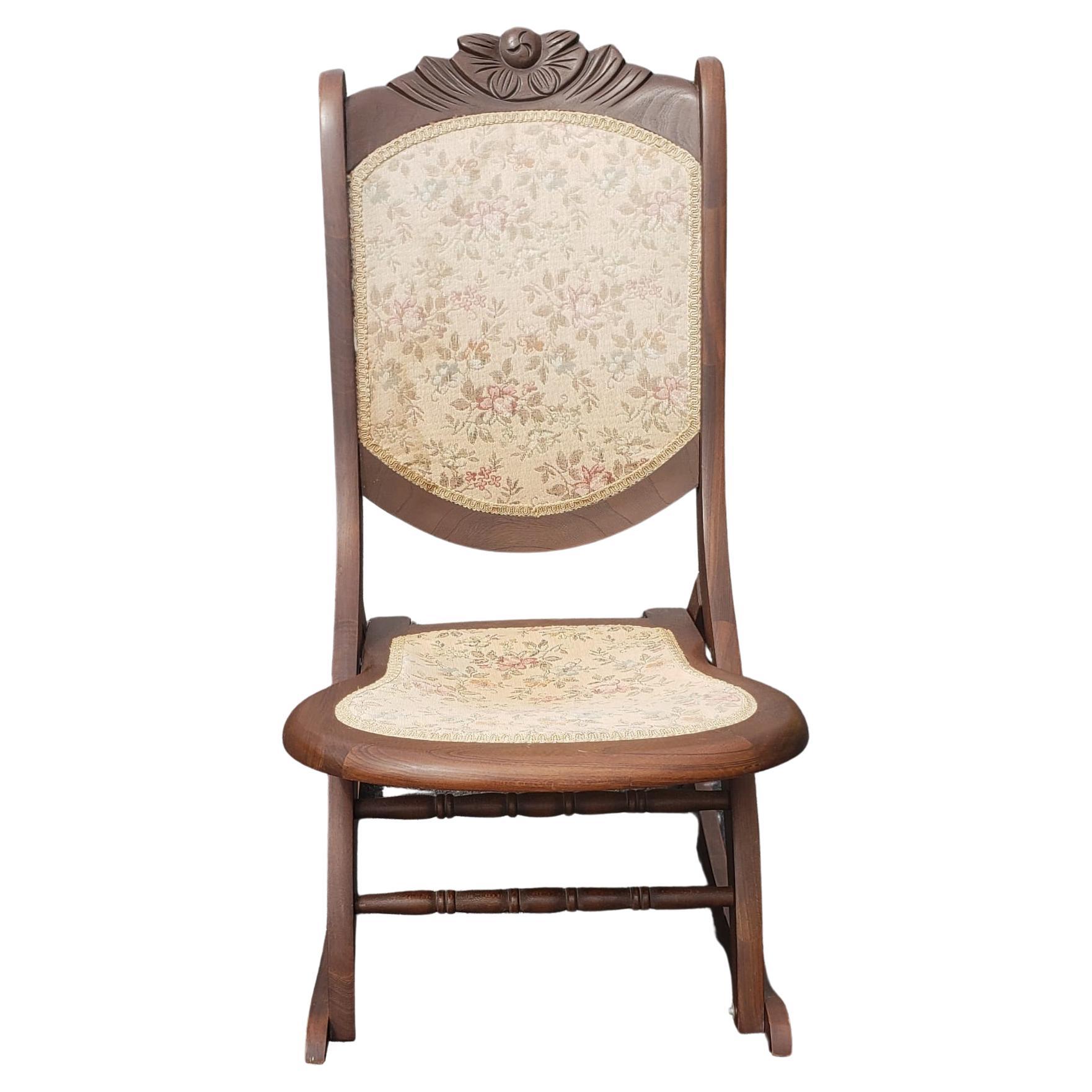 Early 20th Century Carved Walnut and Upholstered Folding Rocking Chair For Sale