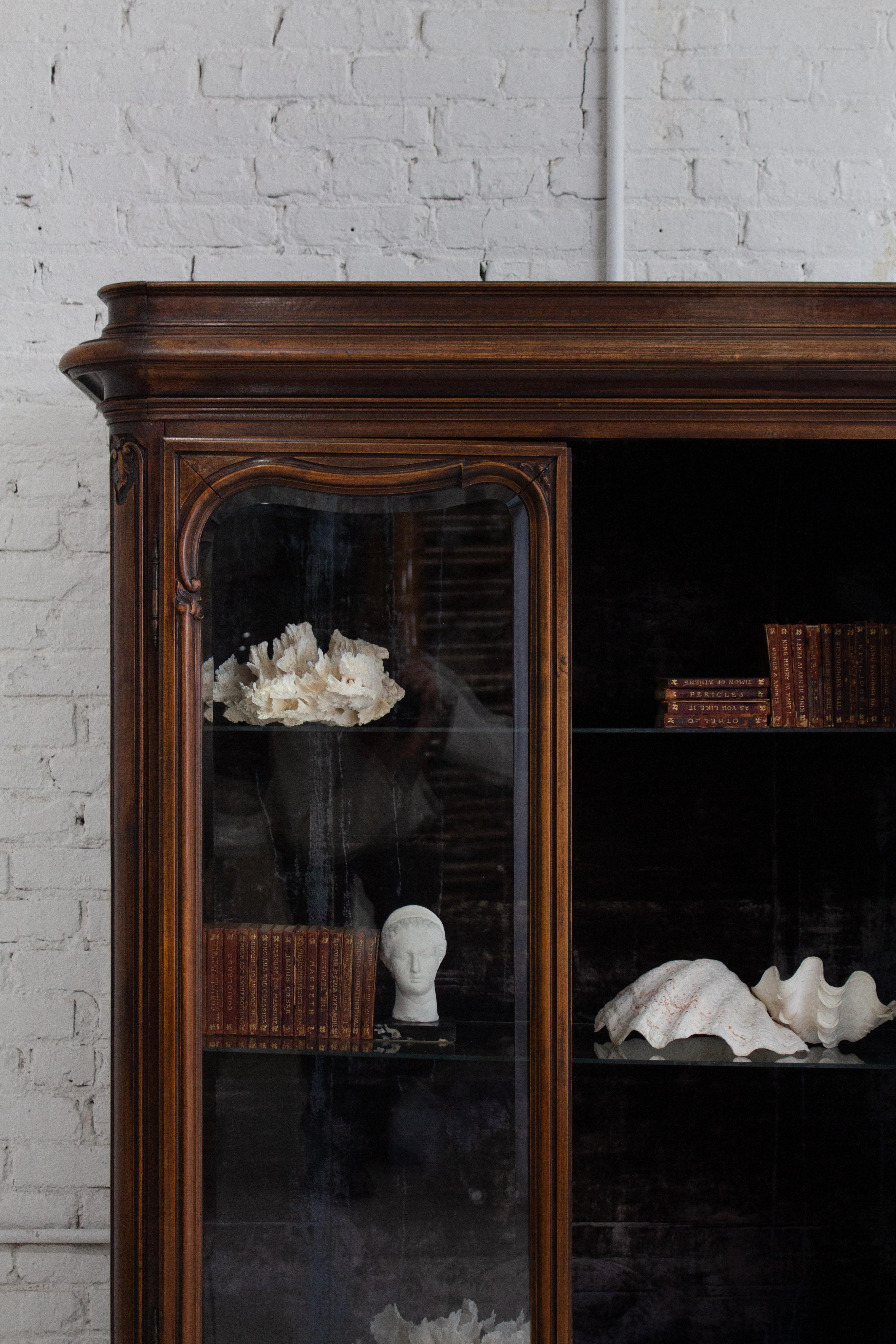 Velvet Early 20th Century Carved Walnut Glass Front Curio Cabinet