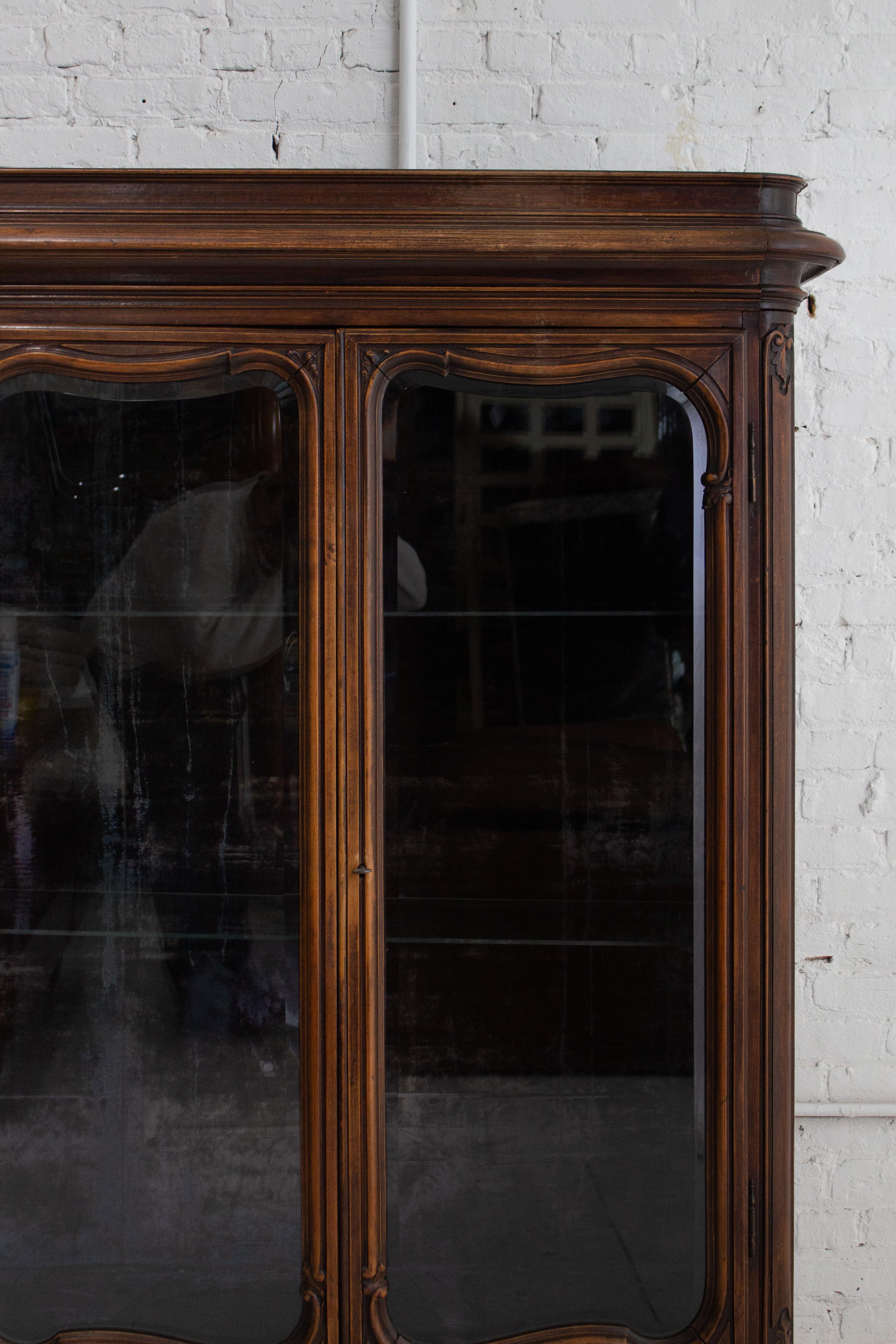 Early 20th Century Carved Walnut Glass Front Curio Cabinet 1