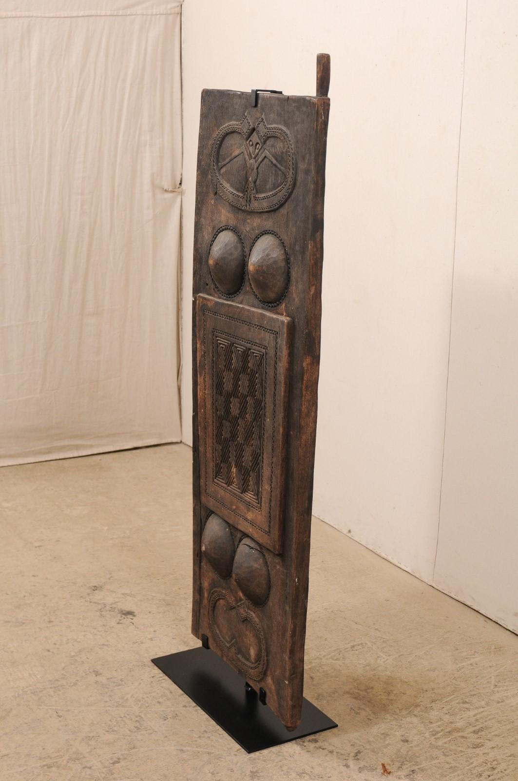 Metal Early 20th Century Carved Wood Tribal Panel from Timor Island, Indonesia For Sale