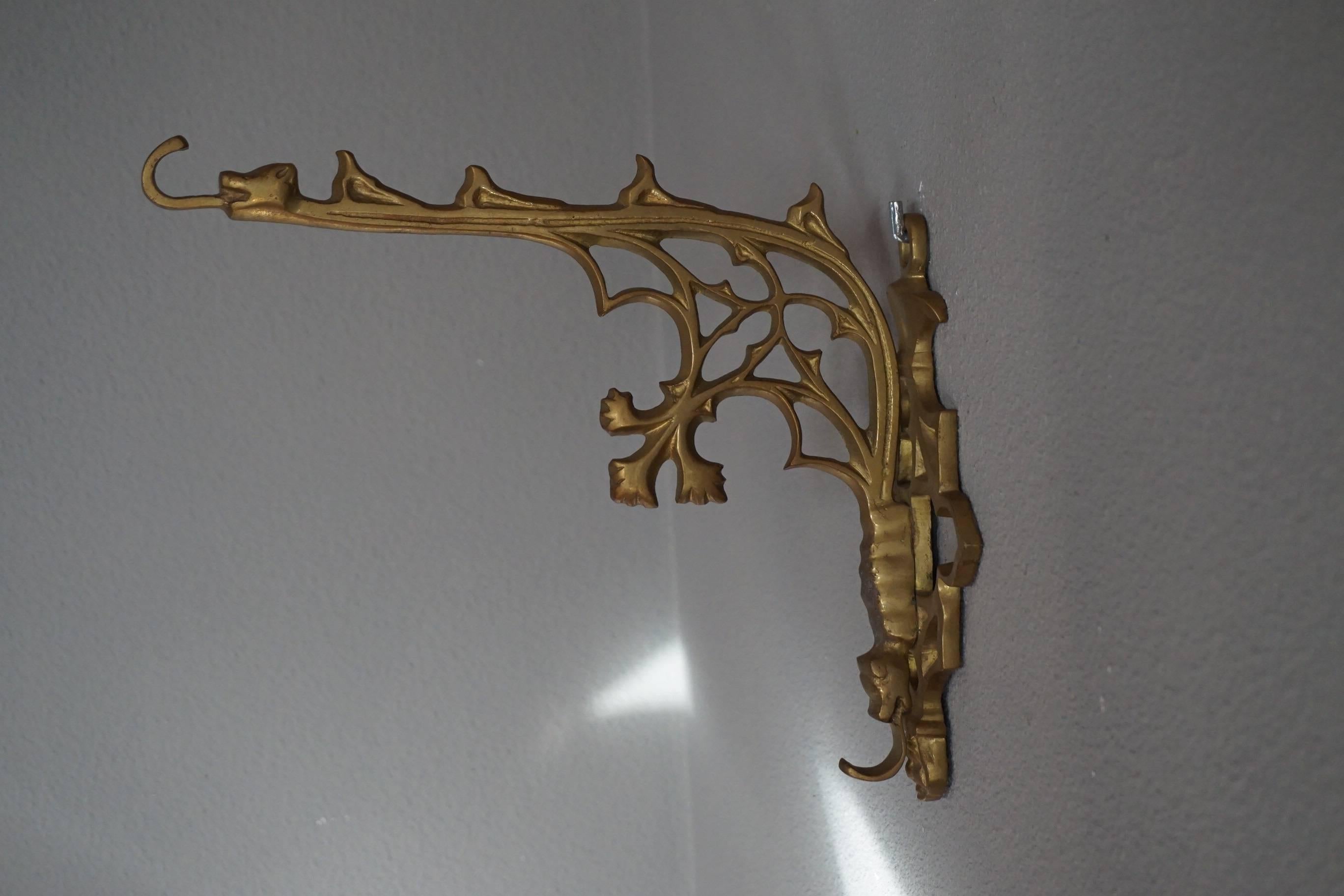 Rare pair of multi-purpose, Gothic art wall brackets.

If you are looking for a decorative pair of Gothic Revival wall brackets then look no further. These stylish Gothic brackets can be used for hanging all kinds of items on. You could also turn