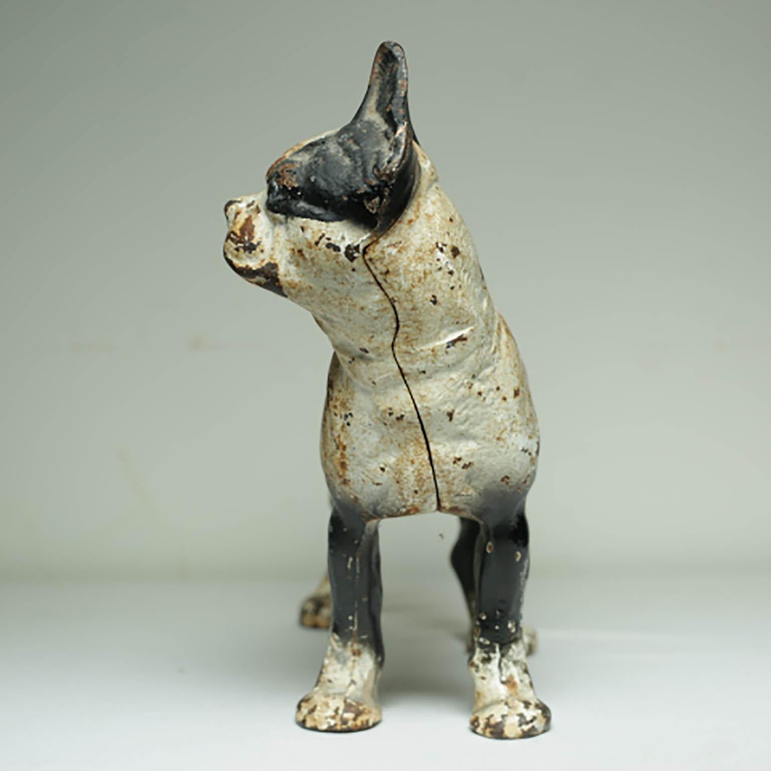 Very charming cast iron Boston Terrier doorstop. Heavy enough to prop a door open or decorate on a shelf or coffee table. Manufactured by Hubley, circa 1930s.
