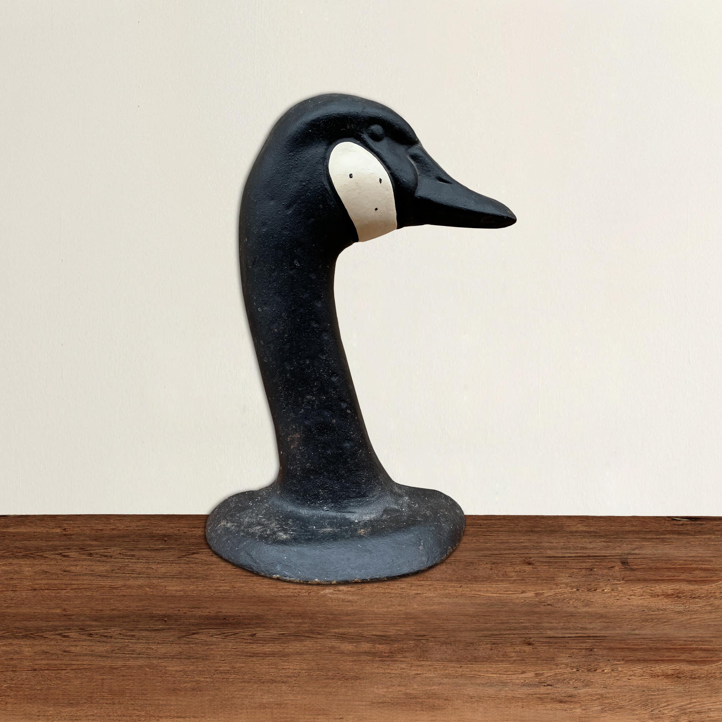 A wonderfully charming early 20th century American cast iron Canada goose doorstop from the RFH Clancey iron works from Needham, Mass.