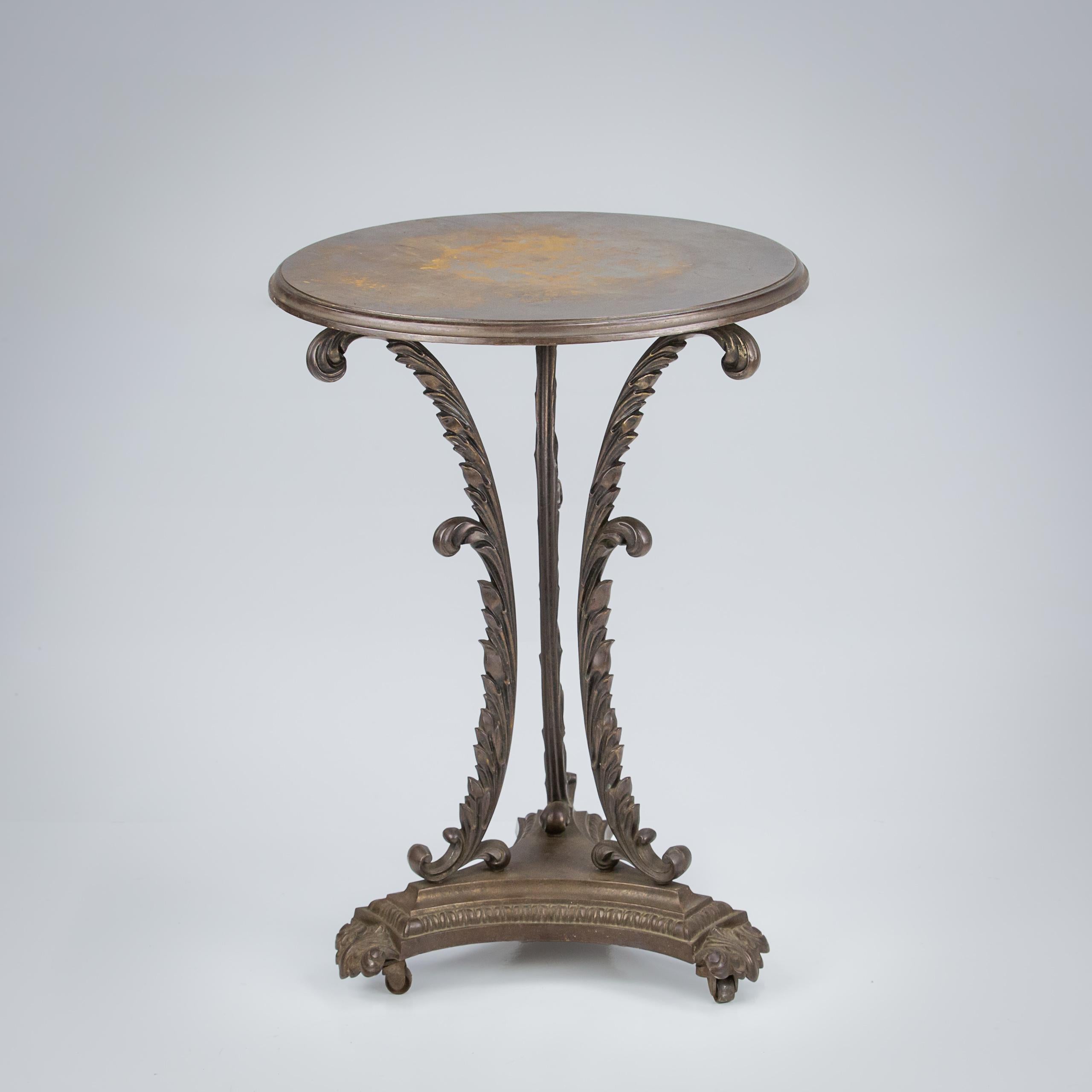 Early 20th Century Iron conservatory table, on original castors, excellent casting.

Unusual patination.

England, Circa 1920.