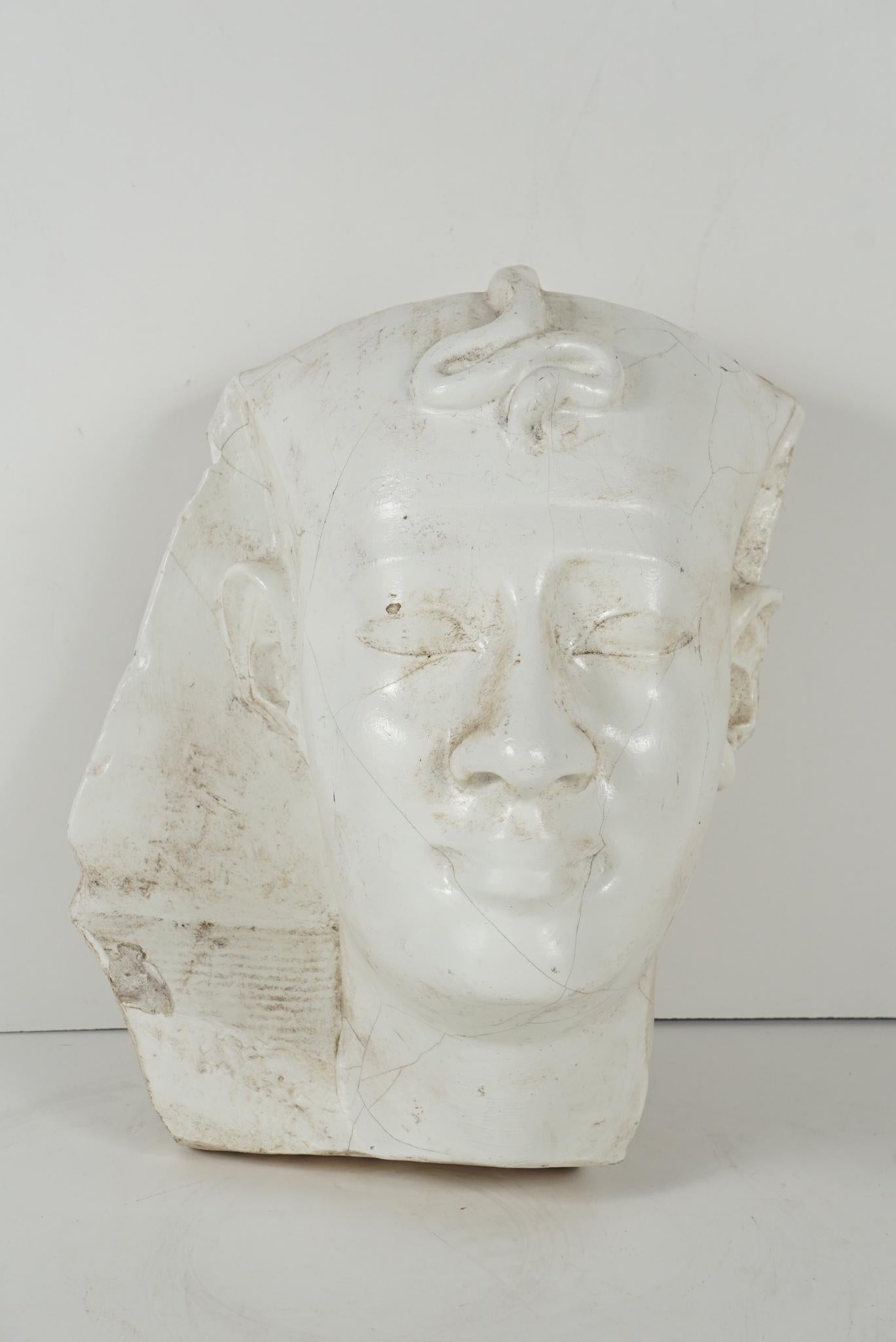 This life-size cast plaster head of a Pharaoh was made in the first quarter of the 20th century. While the discovery by Howard Carter of the undisturbed tomb of King Tut in 1922 certainly led to Egyptian fever, Egyptology and an interest in the Nile