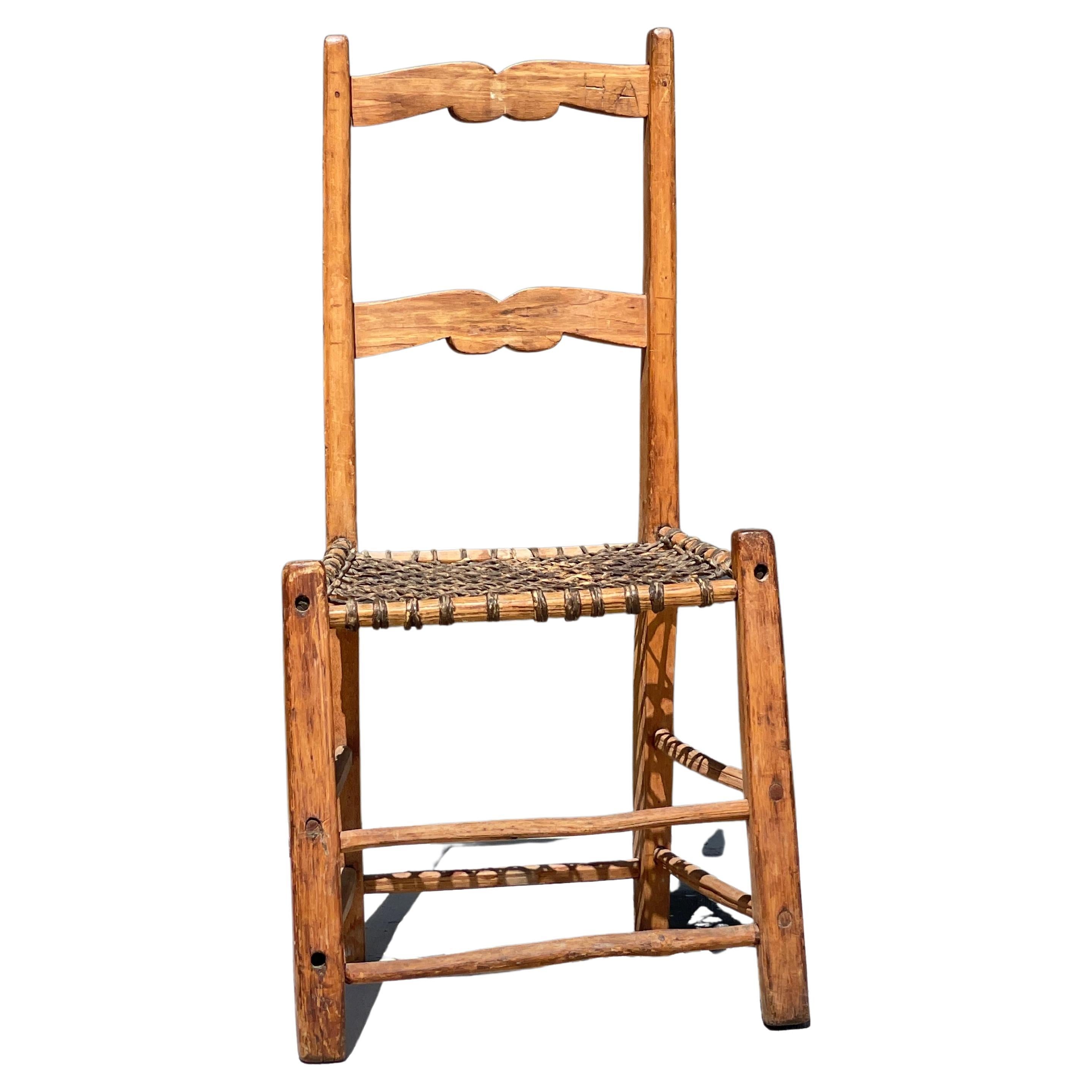 Early 20th Century Catgut Ladder Back Chair