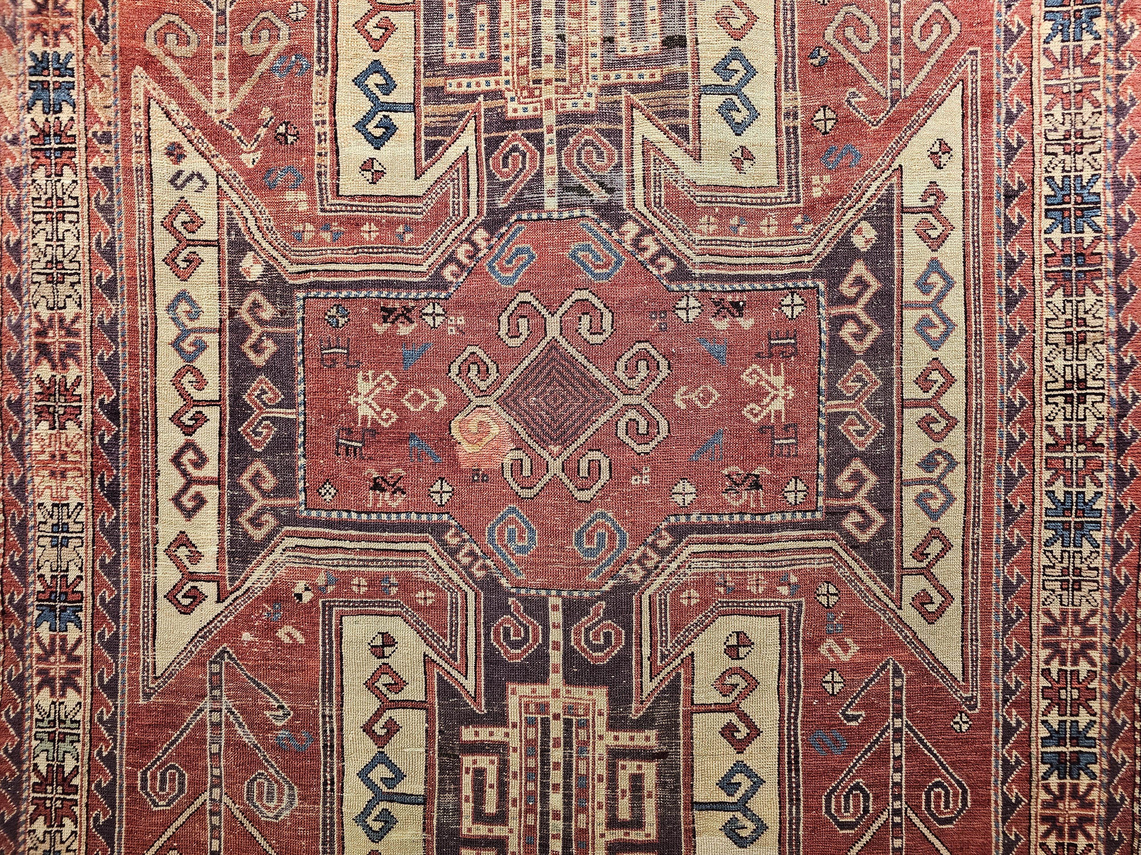 Vegetable Dyed Early 20th Century Caucasian Sevan Kazak in Rust Red, Ivory, Purple For Sale