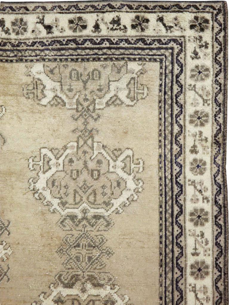 Rustic Early 20th Century Champagne Colored Turkish Handmade Oushak Carpet For Sale