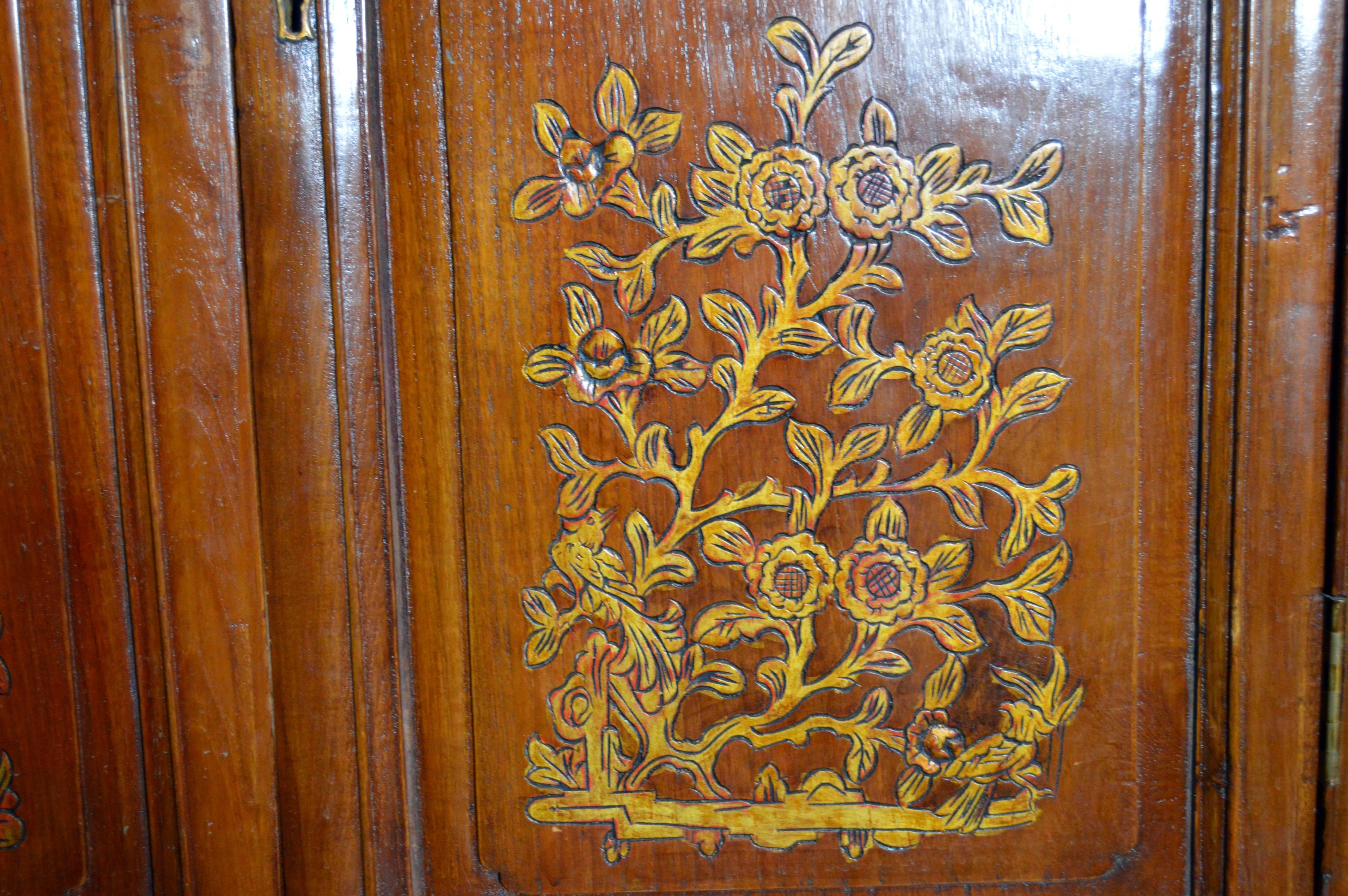 Early 20th Century Chinese Armoire with Gilt Motifs and Hand-Carved Medallions In Good Condition In Yonkers, NY