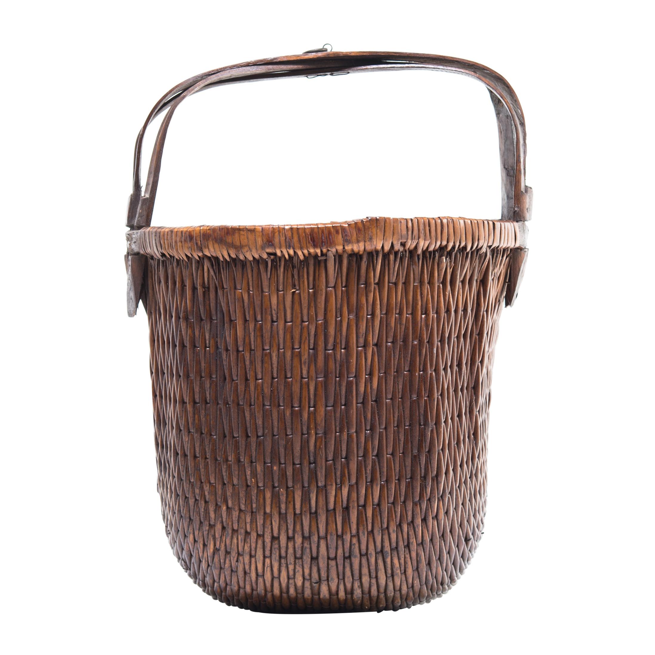 Early 20th Century Chinese Bent Handle Willow Basket