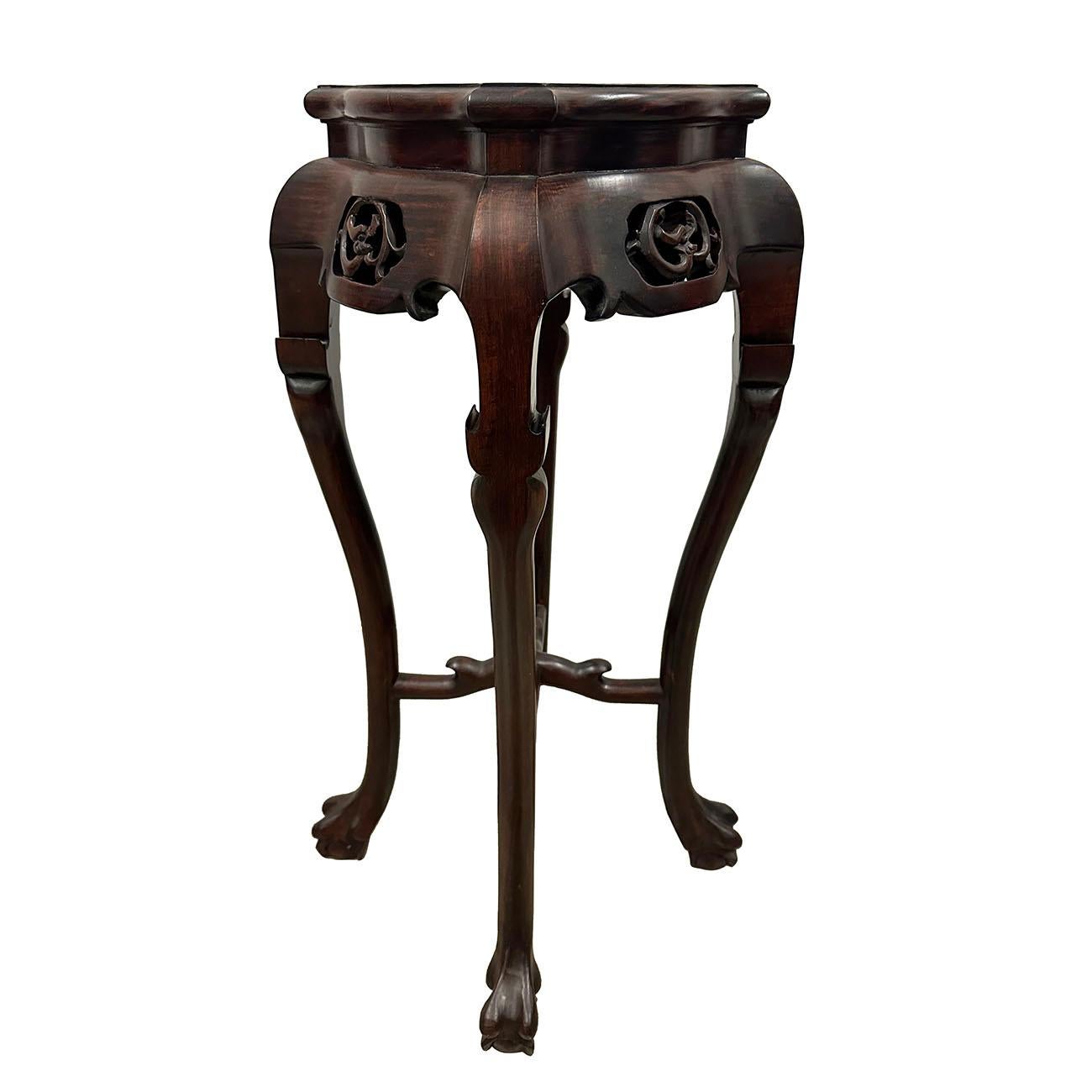This Gorgeous Antique Chinese carved Rosewood Pedestal Table/Plant Stand was hand made from solid Rosewood with traditional carving works design of dragon symbols on the shoulder of the tables. Look at the pictures, you can see that this pedestal