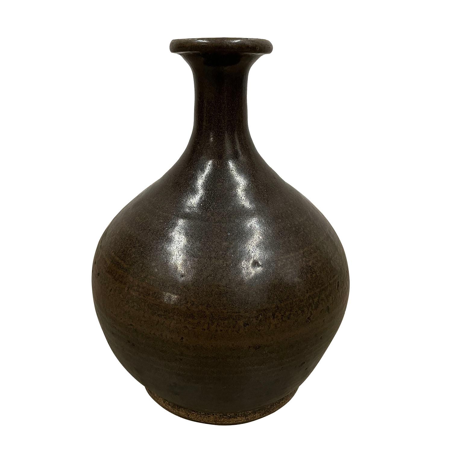 Our wonderful collection of handmade old vintage Chinese hand made glazed pottery vase will make great accent pieces for any room of your house. It has some imperfection signs of age and usage and distressed patina. Take a close look at the detailed