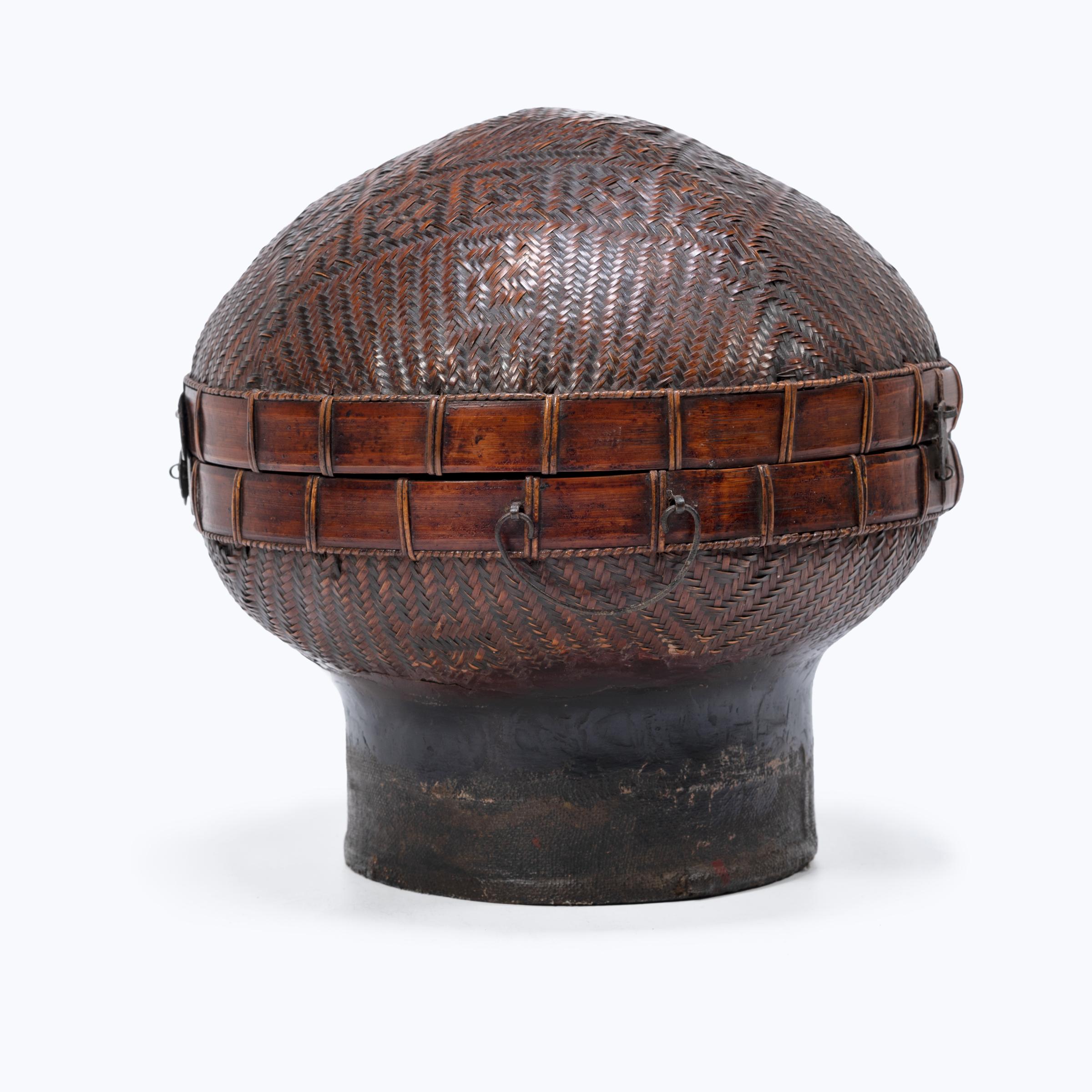 No self-respecting man in Qing-dynasty China would leave the house without some kind of hat. In fact, headgear was so central to social status that even the containers used to store one's hat were beautifully constructed. This 19th-century