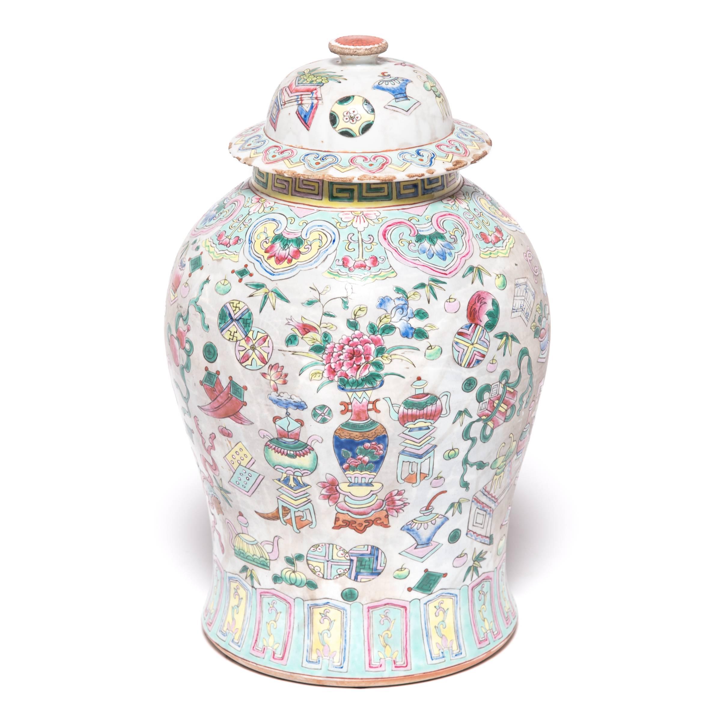 In the early 20th century, Chinese ceramists experimented with a rainbow of vibrant, colorful glazes that brought new energy and innovation to time-honored traditional techniques. This charming porcelain jar was shaped in the ancient baluster form,