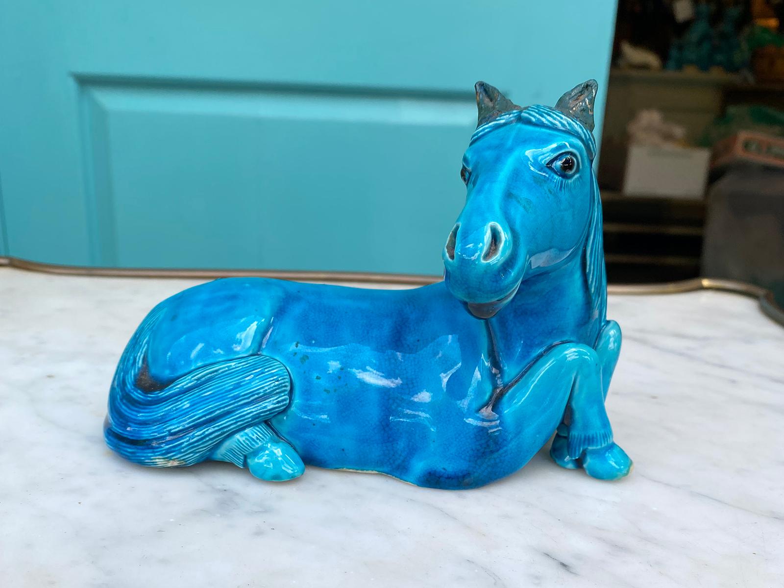 Early 20th century Chinese glazed ceramic recumbent turquoise blue horse, unmarked.