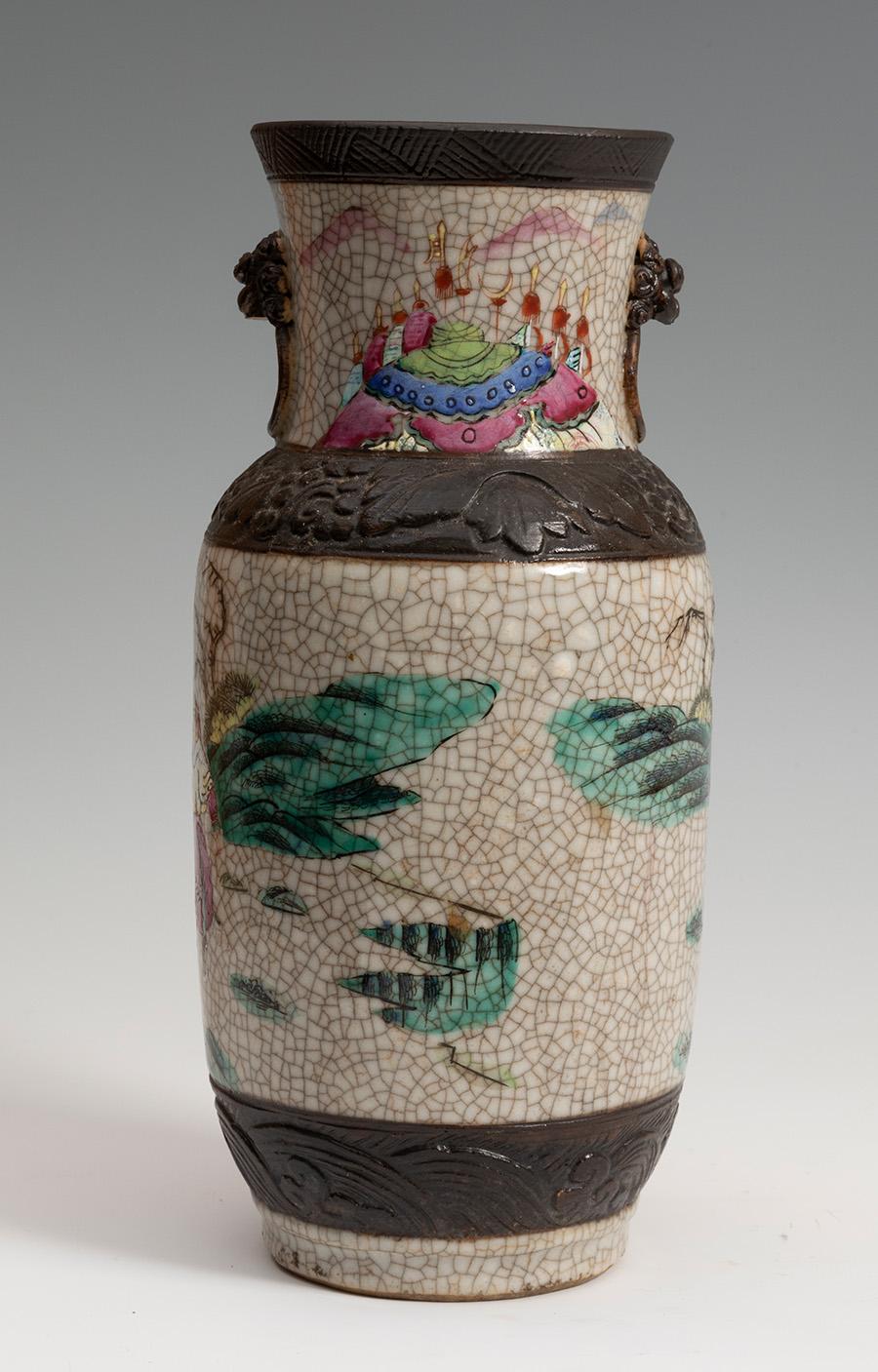 Early 20th century Chinese glazed enamel porcelain decorated with palace courtiers and farmer scenes, edged in brown tone moulding and two lion-heads on the neck.