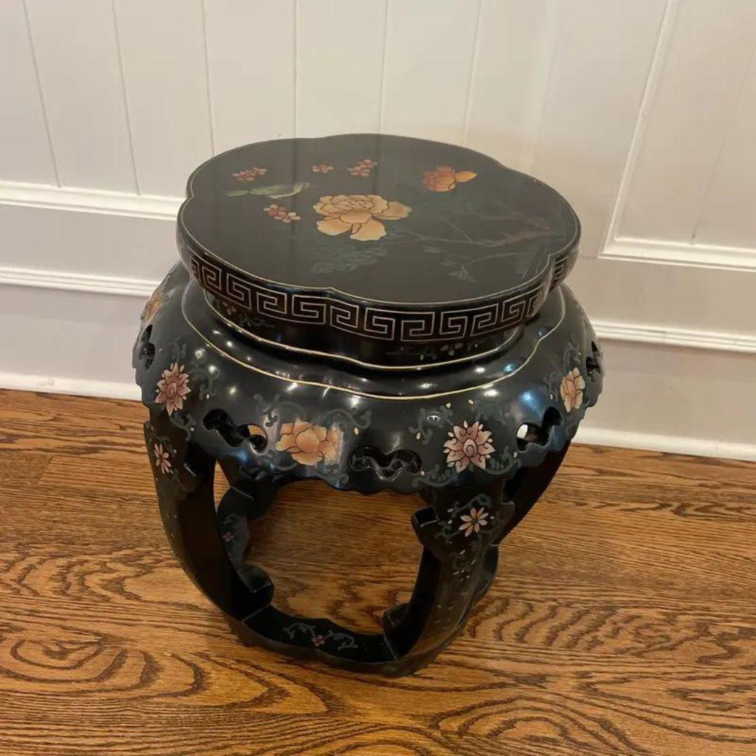 Antique Chinese carved hardwood garden seats or drum stool with five open legs and pierced decoration. Each features a rich red or orange lacquered finish with black and gold applied floral decoration. An absolutely stunning hand-painted Oriental