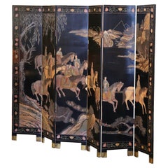 Biombo decorativo chino de seis paneles lacado y ebonizado de principios del siglo XX