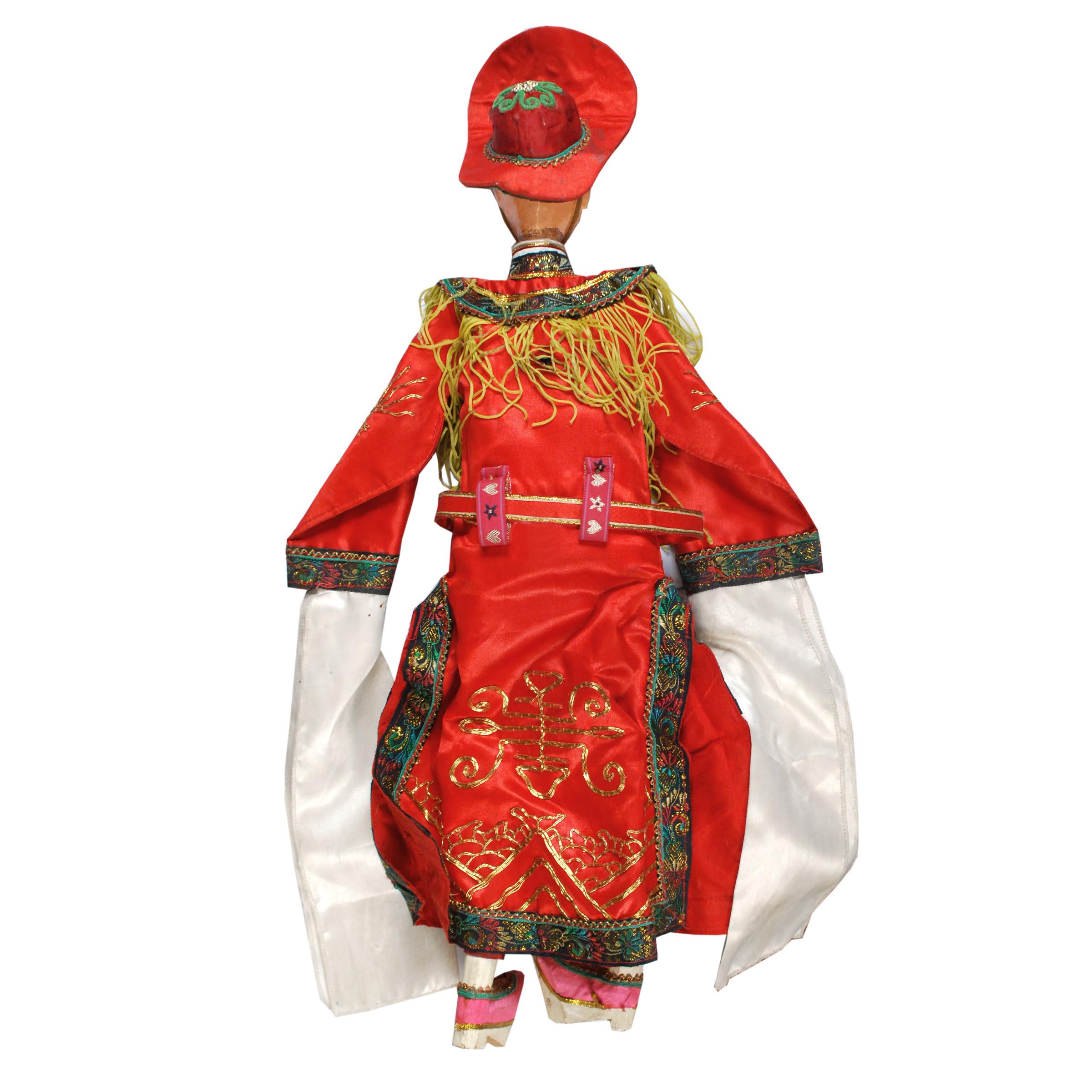 Dressed in fine silks trimmed with embroidered bands and tassels, this puppet brought the glory of the imperial court to the small stage as part of an early 20th century puppet opera. Complete with songs, acrobatics, farce, and drama, Chinese puppet