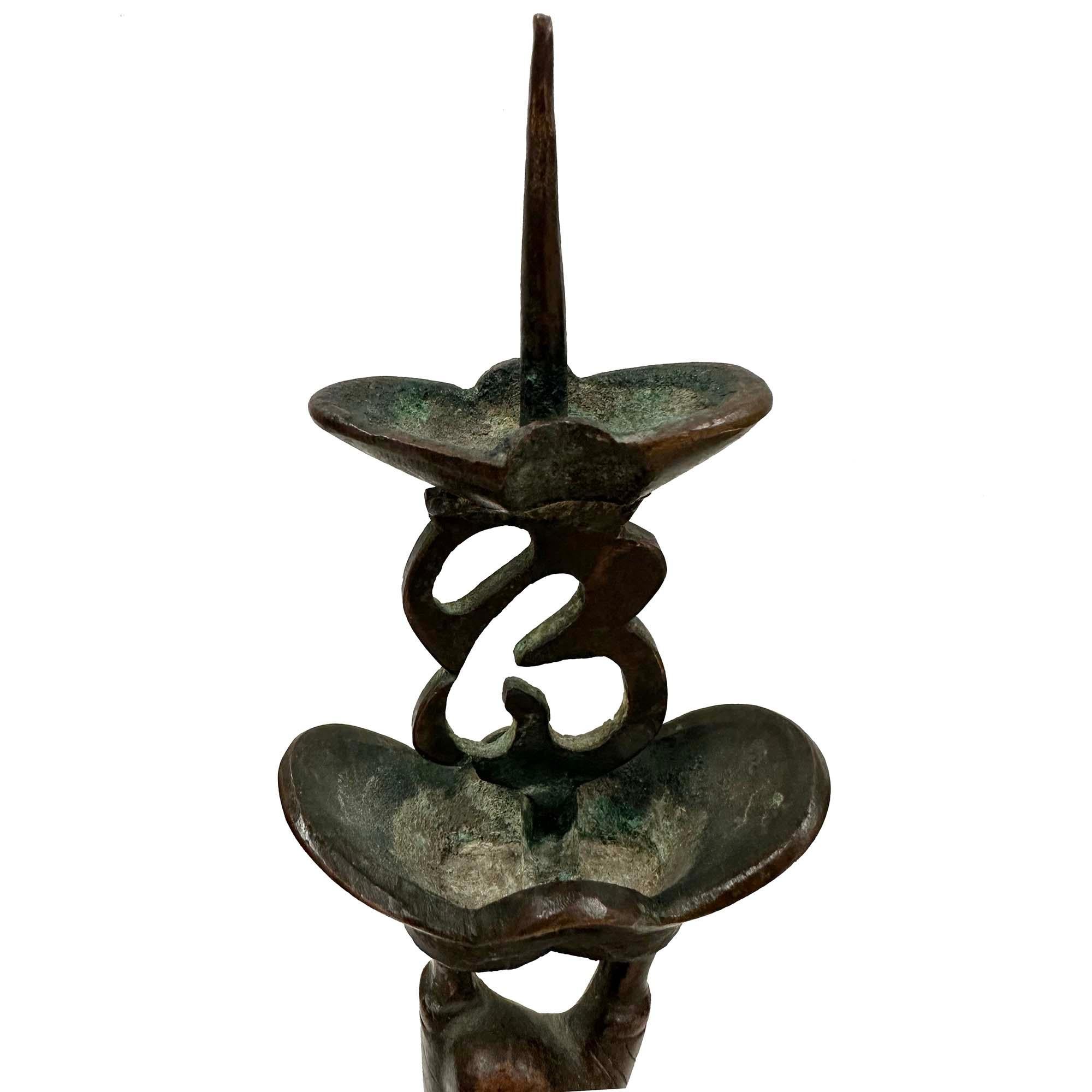Fatto a mano Early 20th Century Chinese Pair of Bronze Happy Buddha Candle Holders in vendita