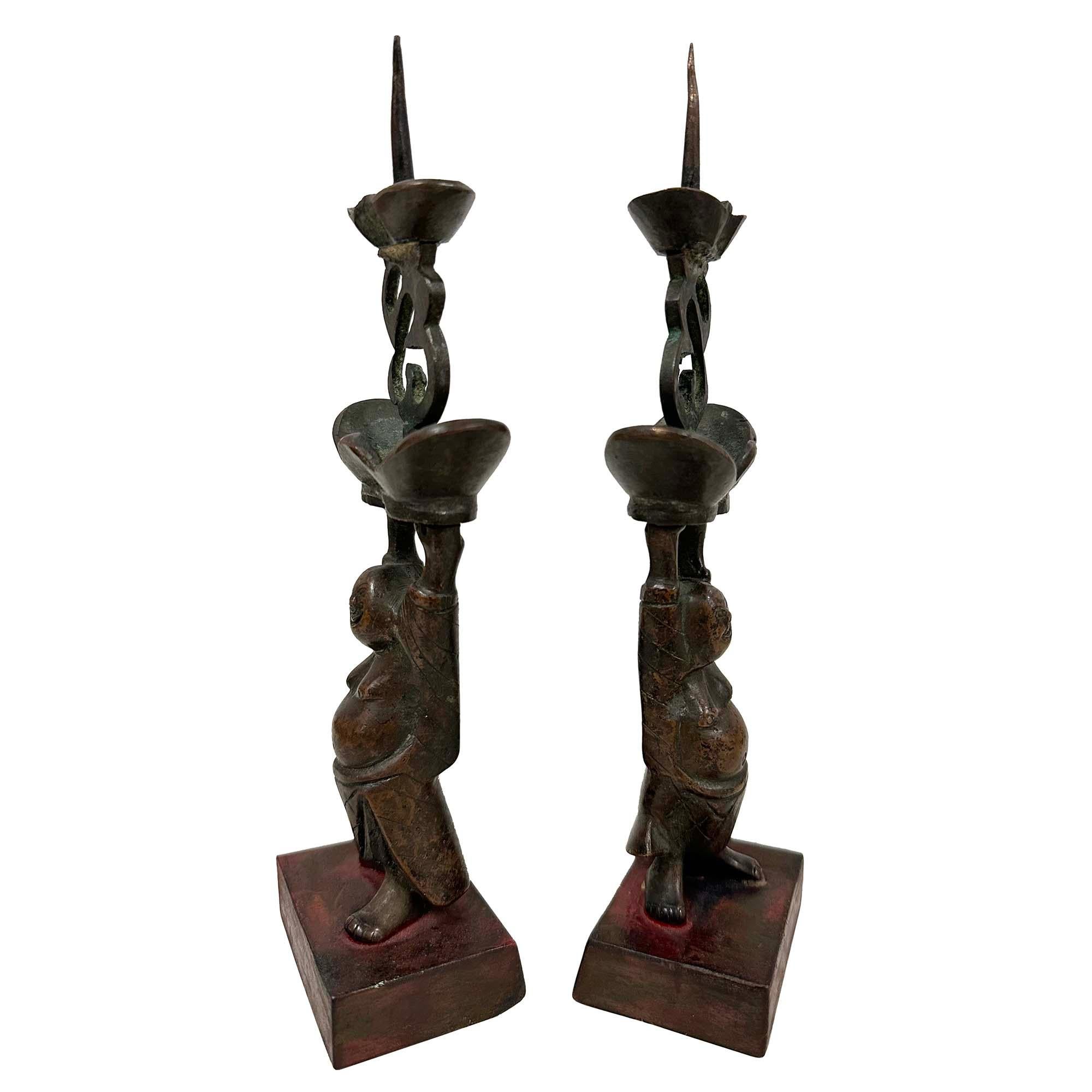 Bronzo Early 20th Century Chinese Pair of Bronze Happy Buddha Candle Holders in vendita
