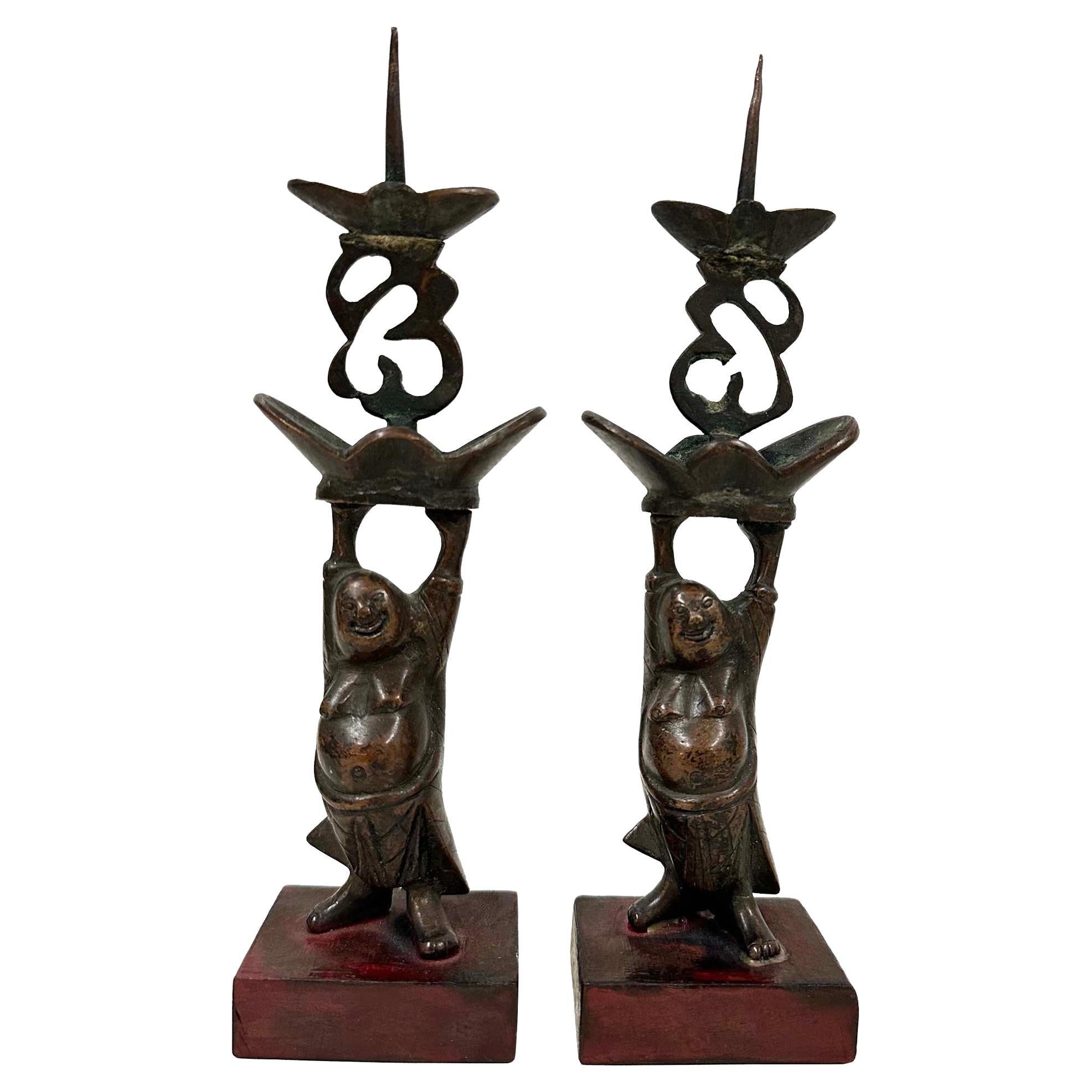 Early 20th Century Chinese Pair of Bronze Happy Buddha Candle Holders