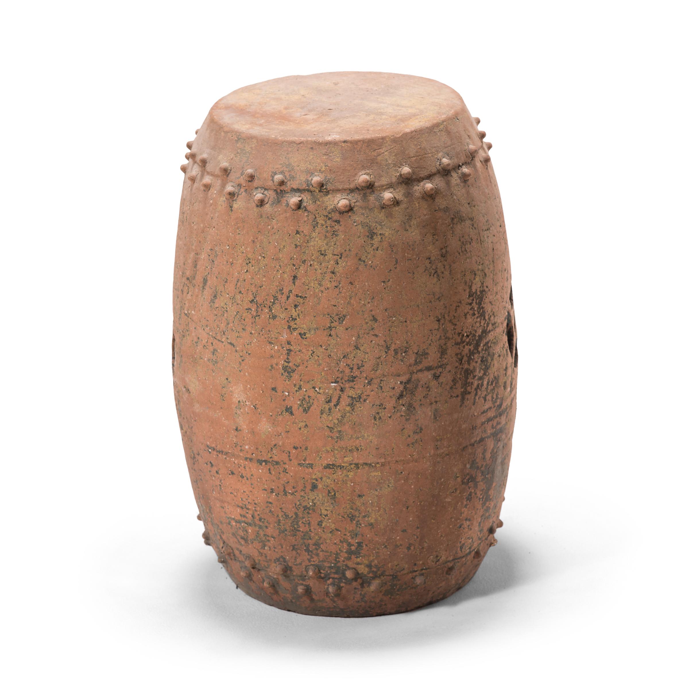 This early 20th century terracotta garden stool was created in Pingyao, an ancient, respected city in China's Shanxi province. With a history dating as far back as circa 800 B.C., Pingyao is widely known for its well-preserved Ming- and Qing-dynasty