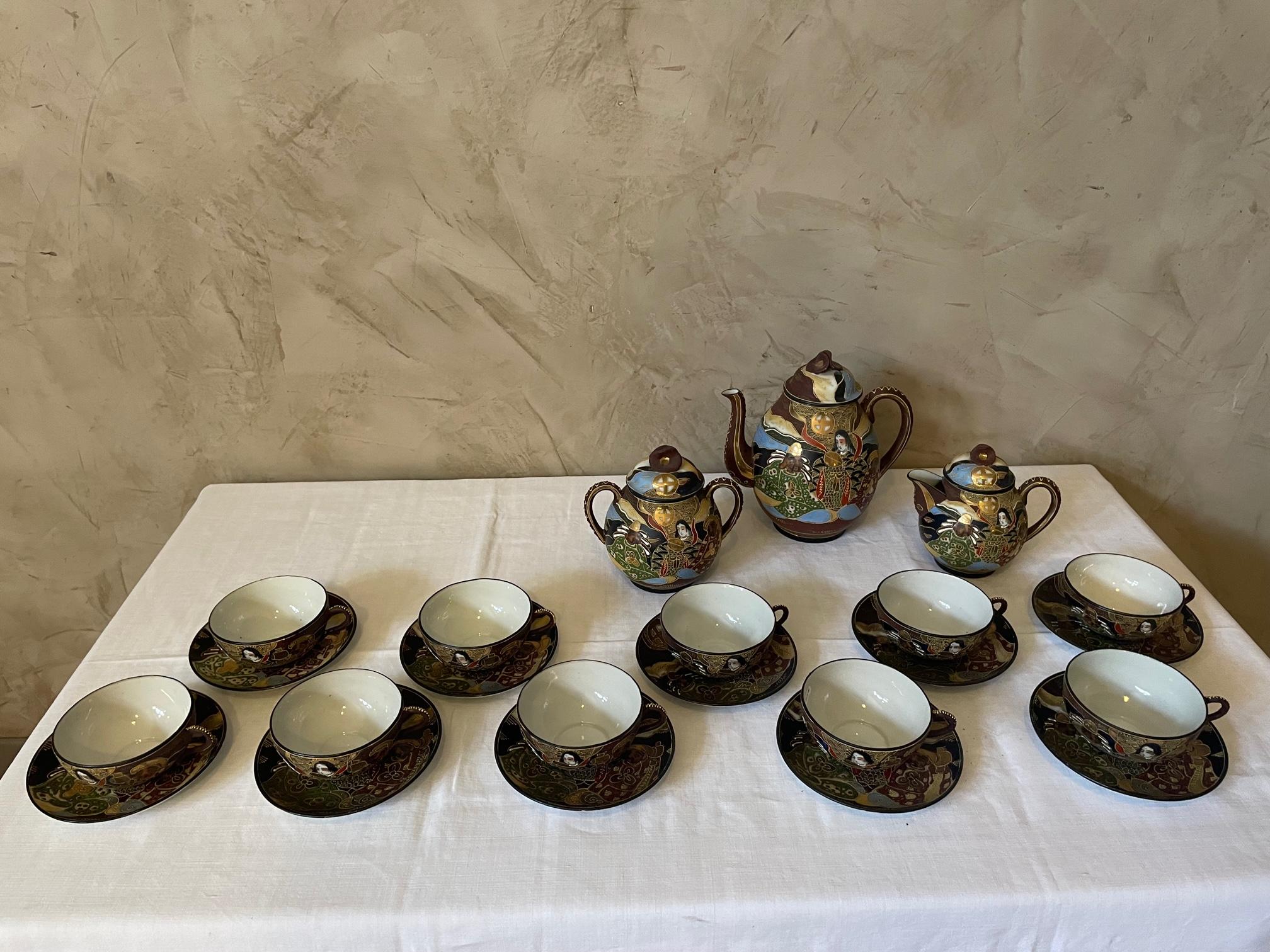 Beautiful Satsuma fine porcelain tea set Moriage Lithophane Geisha. 
Hand painted in brown with white dots - so called moriage, gold, rust-orange and black. Geisha hand painted on each pieces. 
8 tea cups with saucers, a large tea juge, a milk and