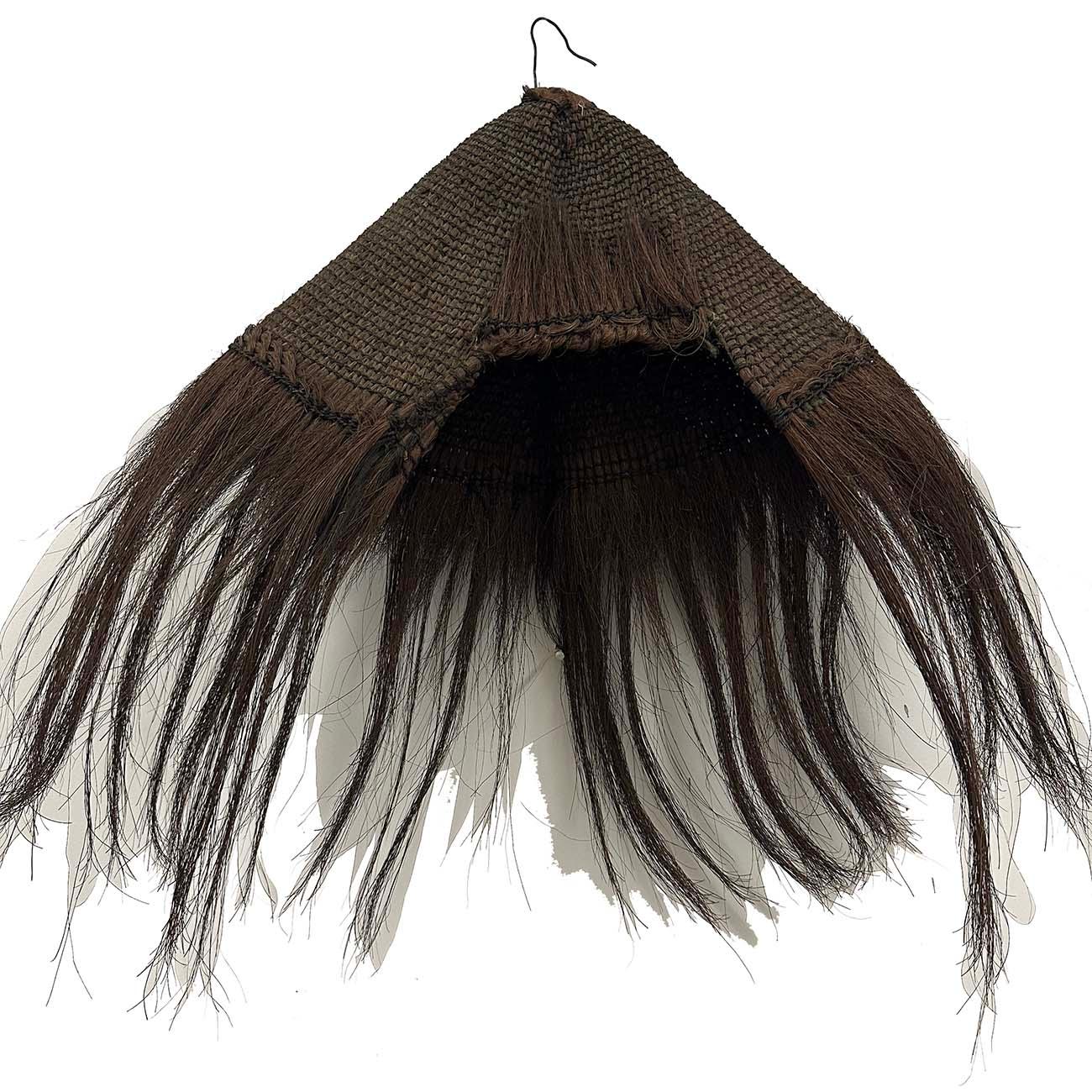 A very rare and pristine condition traditional Chinese raincoat consisting of both an apron skirt, cape and hat made entirely from palm tree and coconut fibers several layers thick. These raincoats were used by farmers, rice pickers and fishermen in