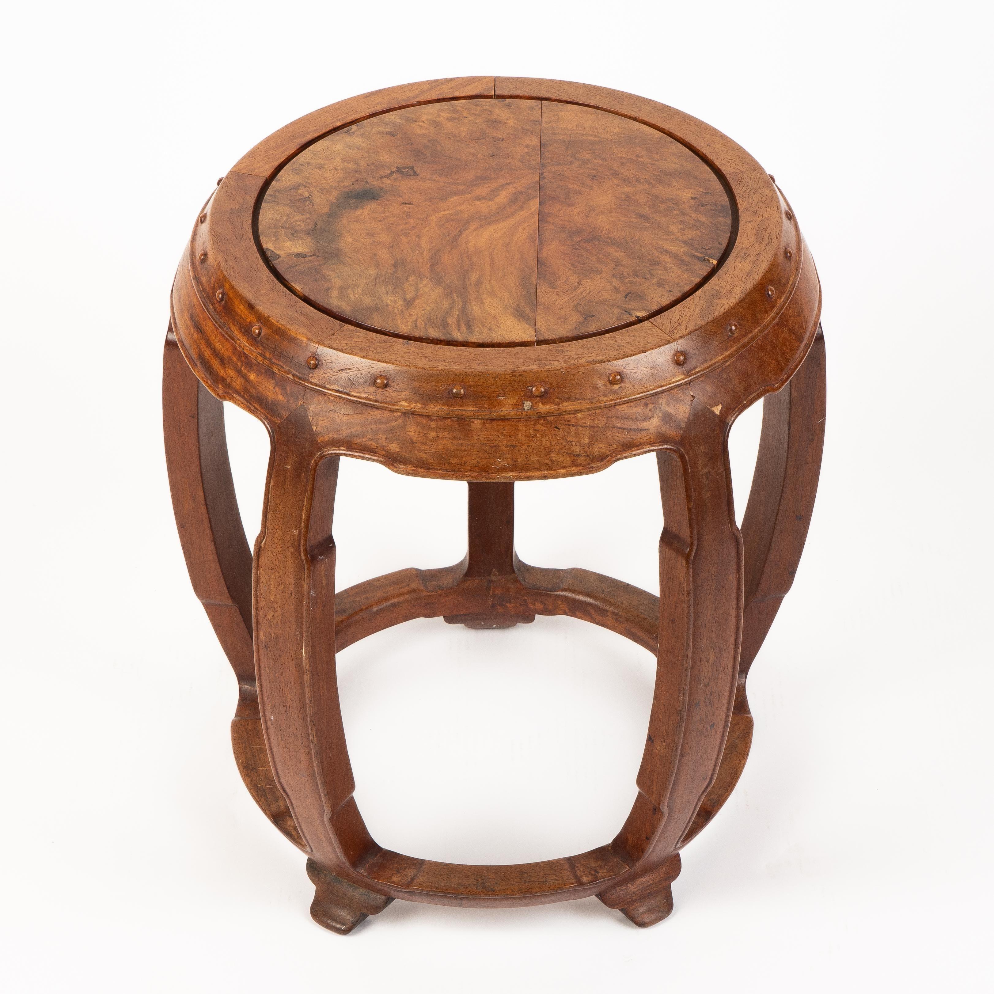 Chinese rosewood barrel shaped garden seat with a burl rosewood top. From the Republic period, in the Ming Dynasty taste.
China, circa 1912-1949.