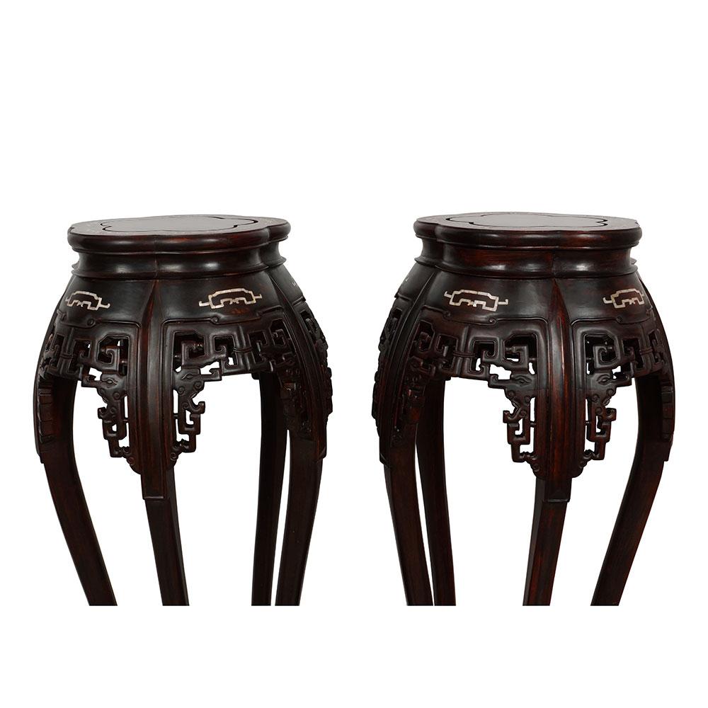 This Gorgeous pair of Antique Chinese carved Rosewood Pedestal Table/Plant Stand are hand made using solid Rosewood with traditional carving works design and Mother of pearl inlay on the top and shoulder of the tables. There are a lot of Chinese