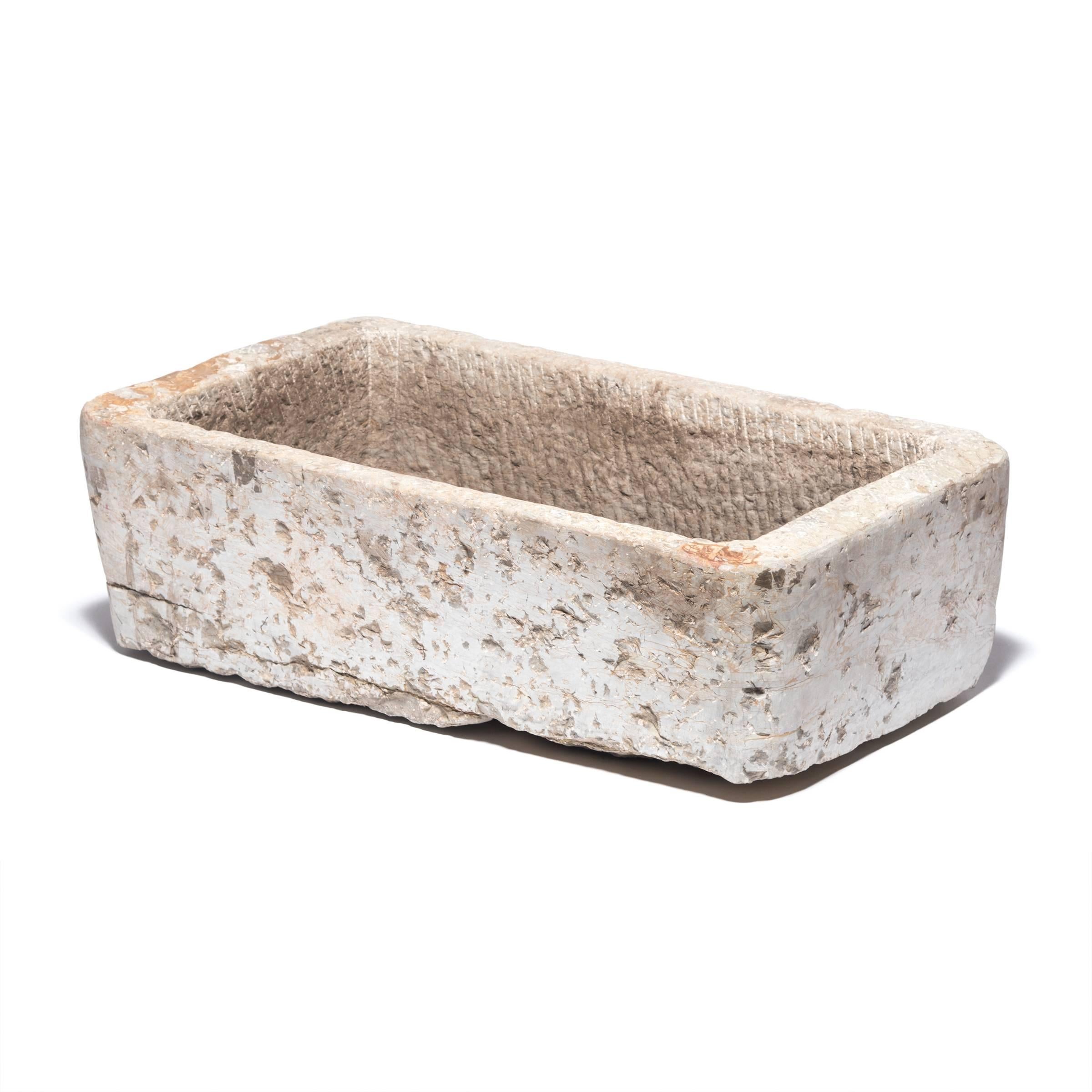Prized mounts once took refreshment from this stone trough, carved from a solid block of limestone more than hundred years ago. Once purely functional, the trough is celebrated today for its elegant, simple form and rustic authenticity. With