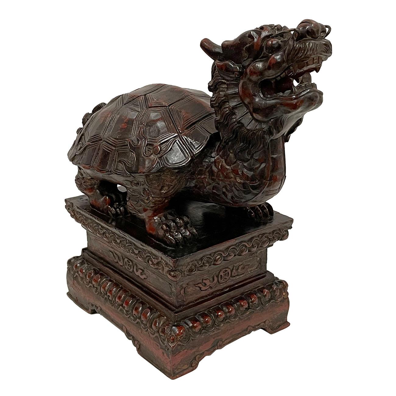 This is a magnificent Chinese Antique Wood Carved Dragon Turtle Sculpture. It shows very detailed hand carving works on it. It is all hand made and hand carved. It was the mascot in the imperial family, meaning the supreme power. You can see from