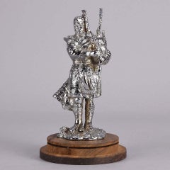 Early 20th Century Chrome on Brass Car Mascot Entitled "Bagpipes"
