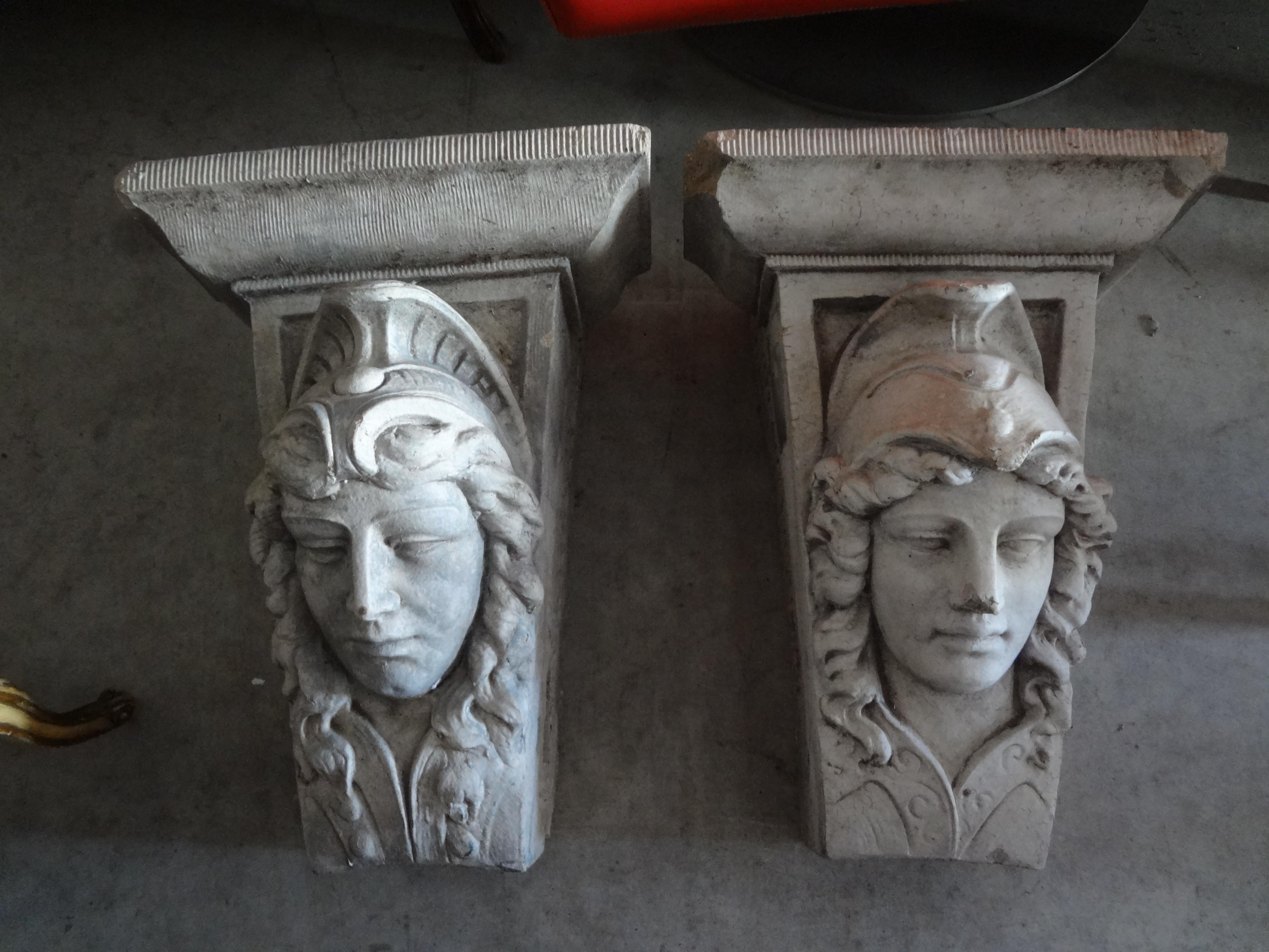 Great pair of early 20th century classical Roman style cast cement architectural figural wall corbels. This well cast pair of corbels, wall brackets or wall-mounted sculptures would work equally well indoors or in a garden.
Dimensions:
20