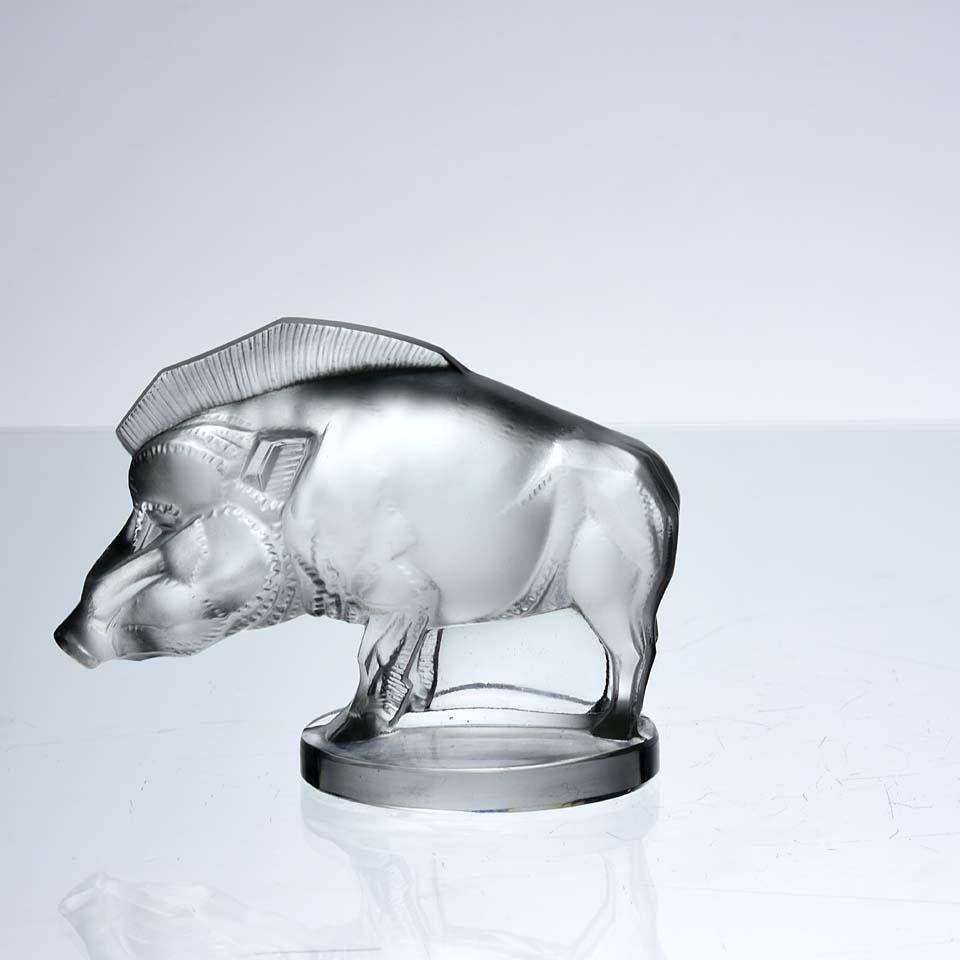 Excellent Art Deco car mascot in the form of a stylised boar with very fine hand chased surface detail, signed R. Lalique France

Sanglier
Catalogue Number: 1157
Signature identification: Moulded “R. Lalique France” signature
Date introduced: