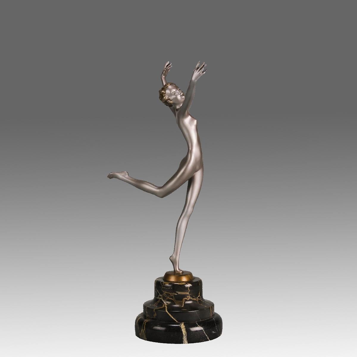 An energetic early 20th Century Art Deco cold painted bronze figure of a young agile beauty in a balanced dancing pose. The bronze exhibiting excellent colour and very fine hand chased surface detail, raised on a stepped onyx & marble base and