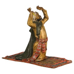 Bronce pintado en frío de principios del siglo XX titulado "Hombre que reza", de Franz Bergman