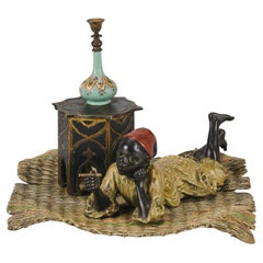 Early 20th Century Cold-Painted Bronze "Reclining Smoking Boy" by Franz Bergman