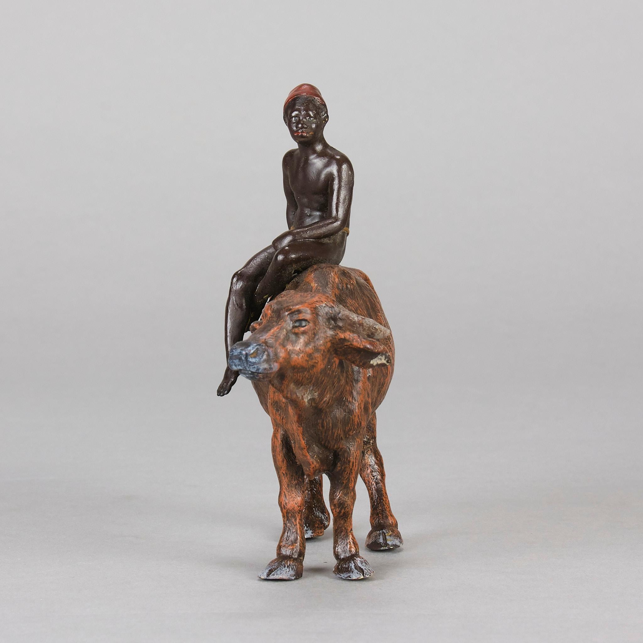 Cold-bemalte Bronzeskulptur „Boy on Ox“ aus dem frühen 20. Jahrhundert von Franz Bergman (Gegossen) im Angebot