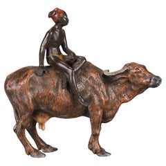 Antique Early 20th Century Cold-Painted Bronze Sculpture "Boy on Ox" by Franz Bergman