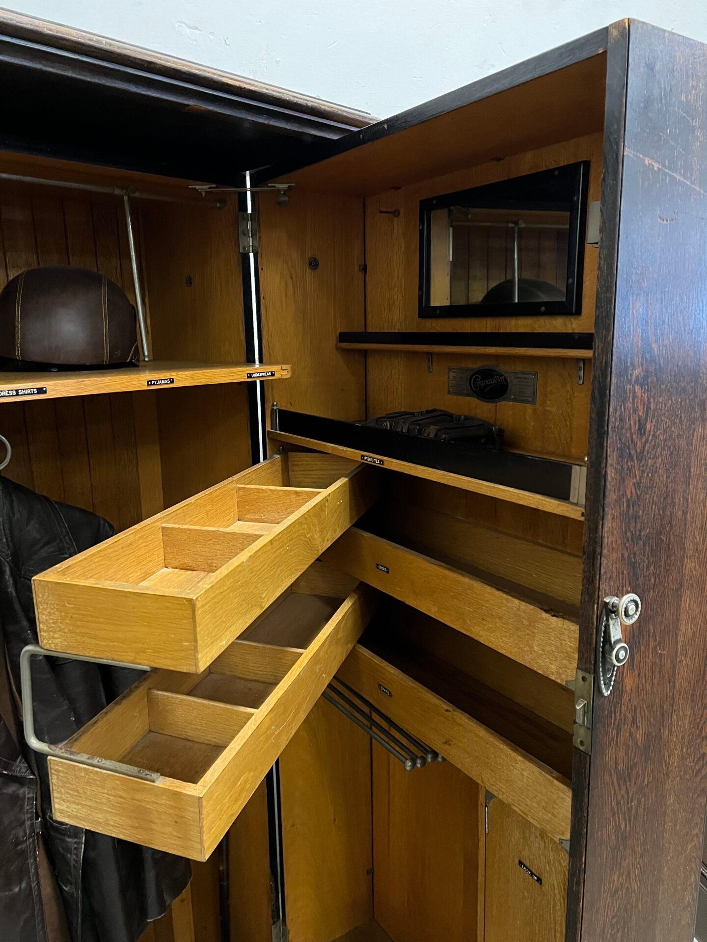 Rare cabinet made around 1910 by Compactom, based in London. Specialized in manufacturing refined furniture for the Gentleman. Also this great closet in which a man could store all his beautiful good and also take with him on a trip, for example, on