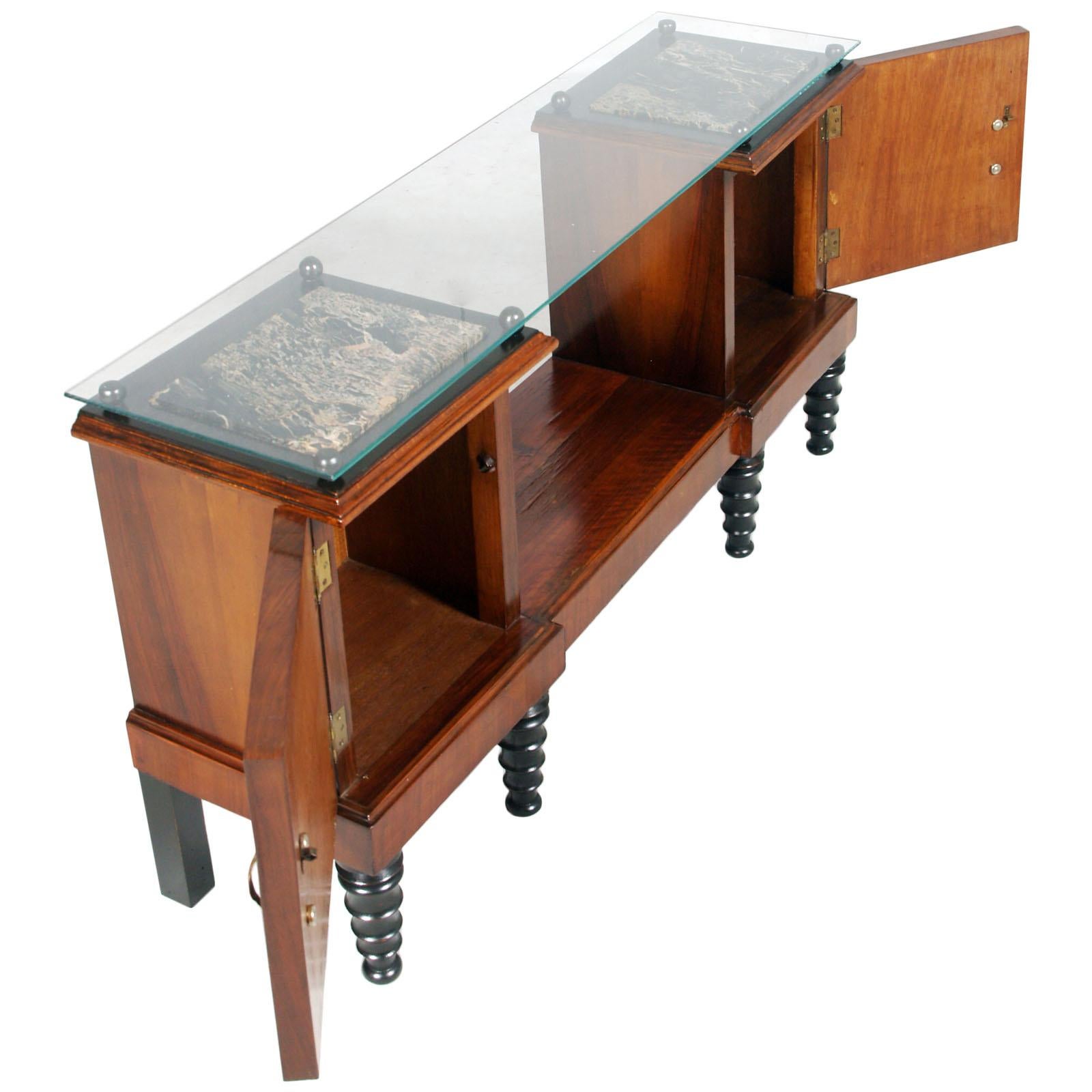 1920s Art Deco entrance cabinet, console , in burl walnut and ebonized walnut . Black marble with white veins . Two cabinet with top in crystal.

 Measures cm: H 60, L 118, P 31.