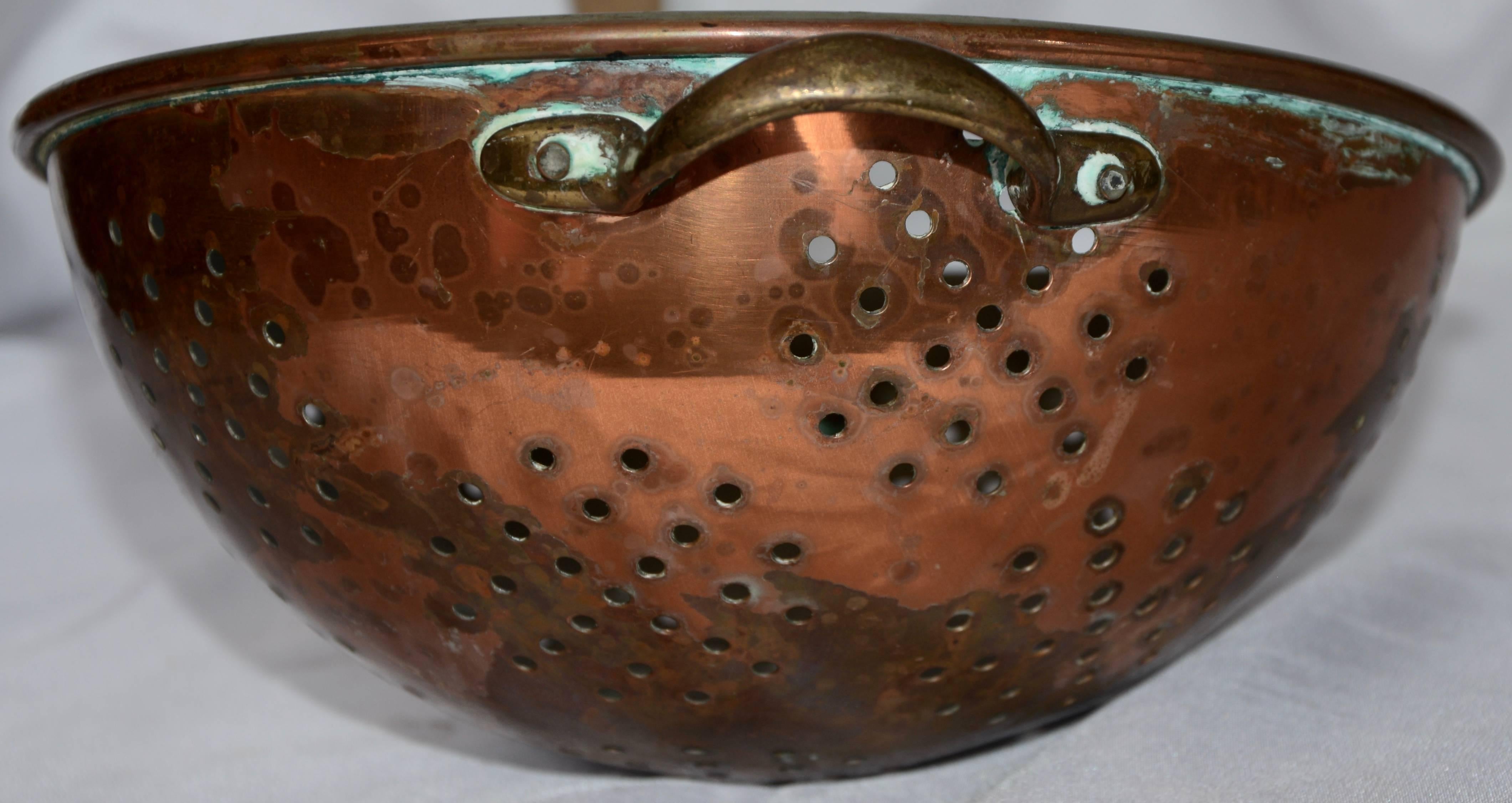 vintage copper colander with handle