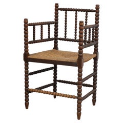 Antique Early 20th Century Cottage Style Bobbin Armchair with Rattan Seat