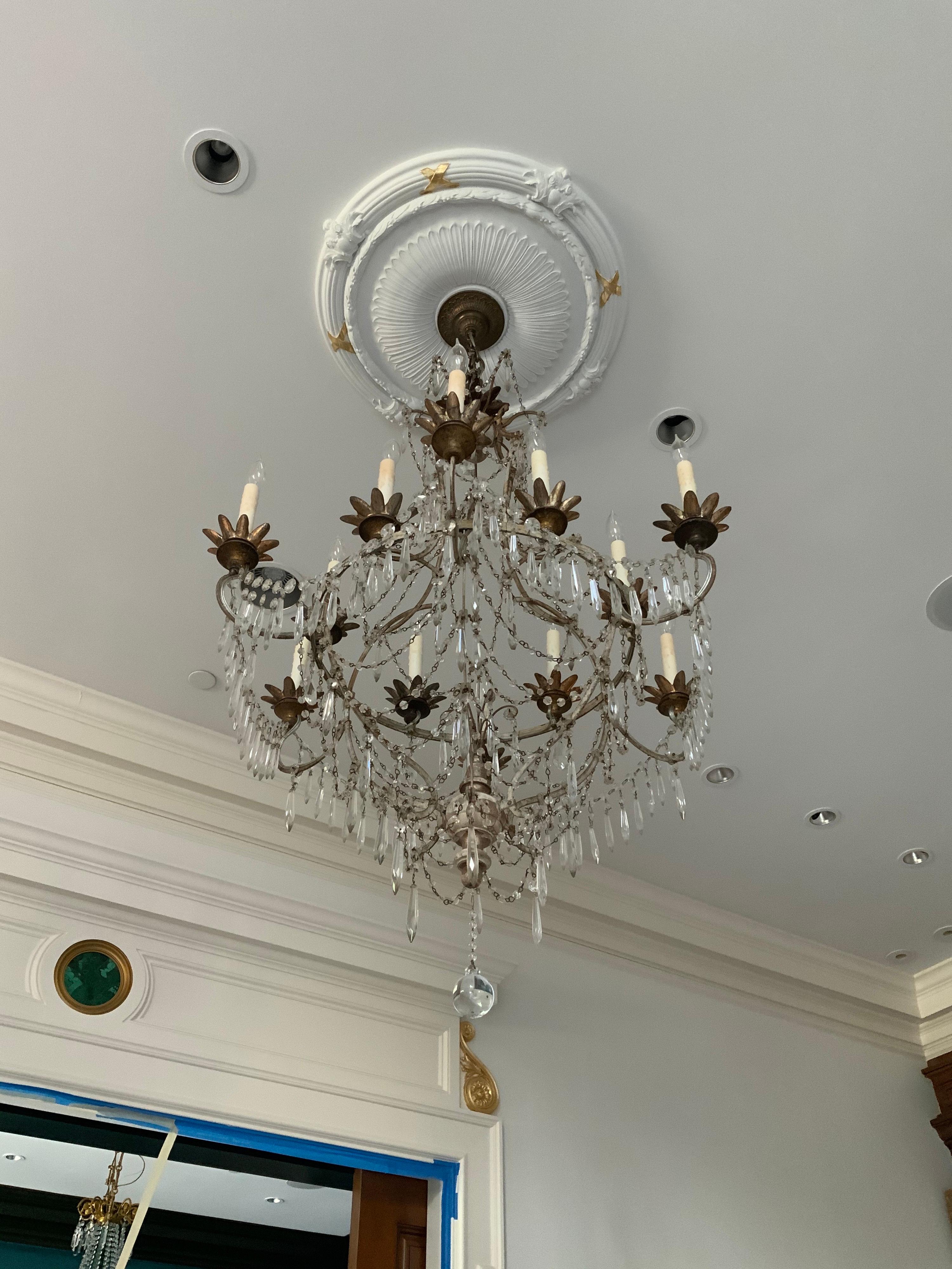 This crystal chandelier origins from France, circa 1910.